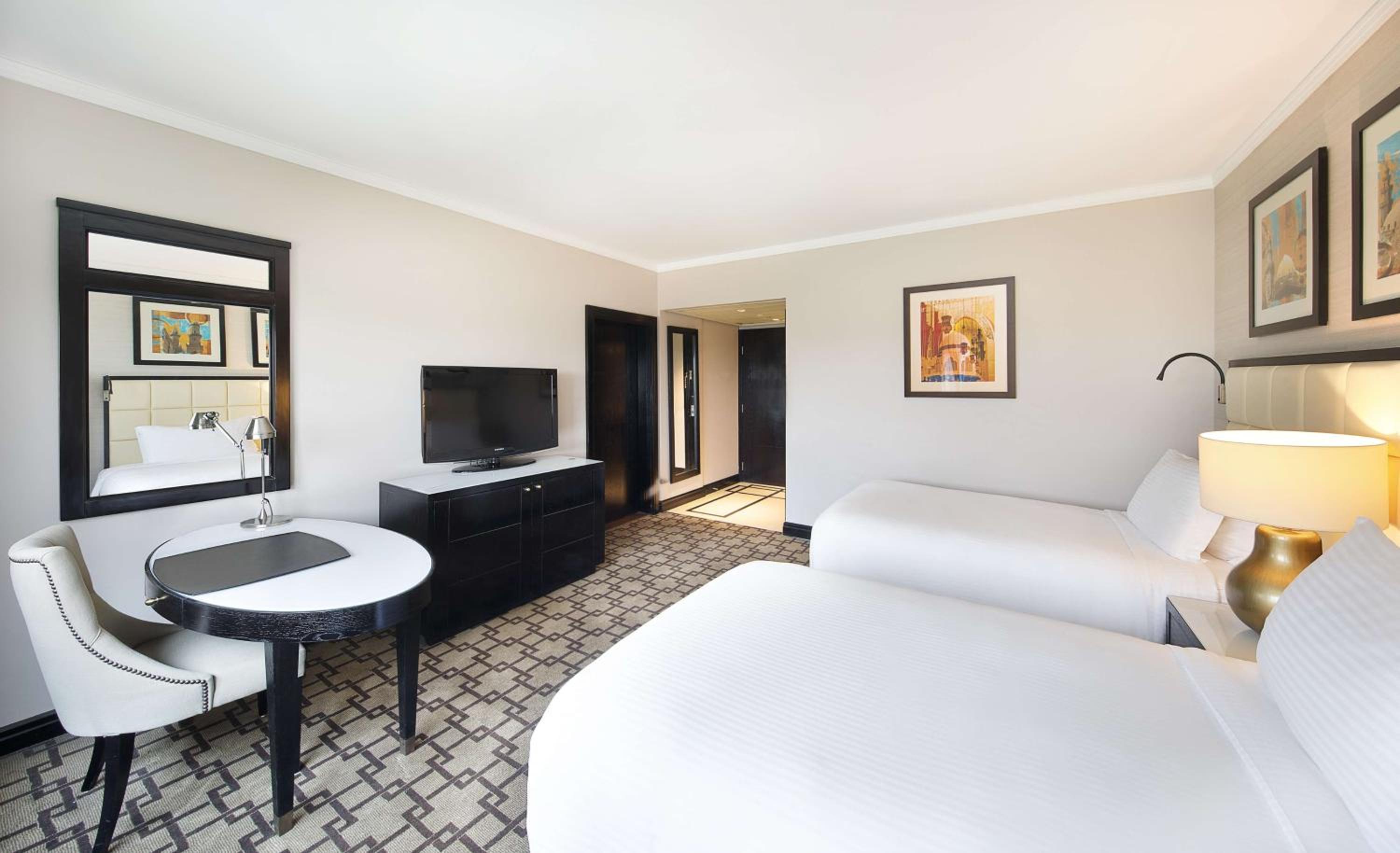 One Bedroom Suite with Connected Room Pool View thumbnail 6
