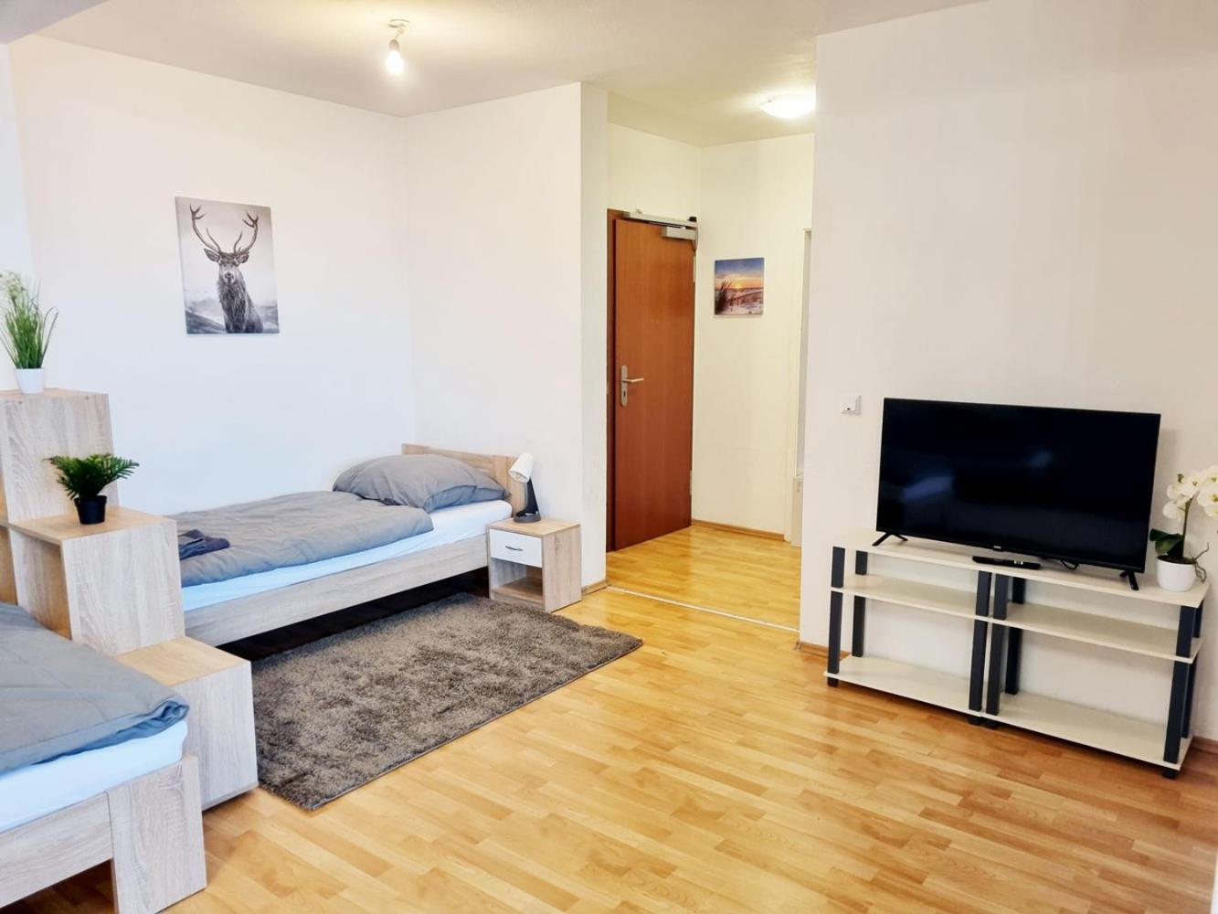Three-Bedroom Apartment photo 1