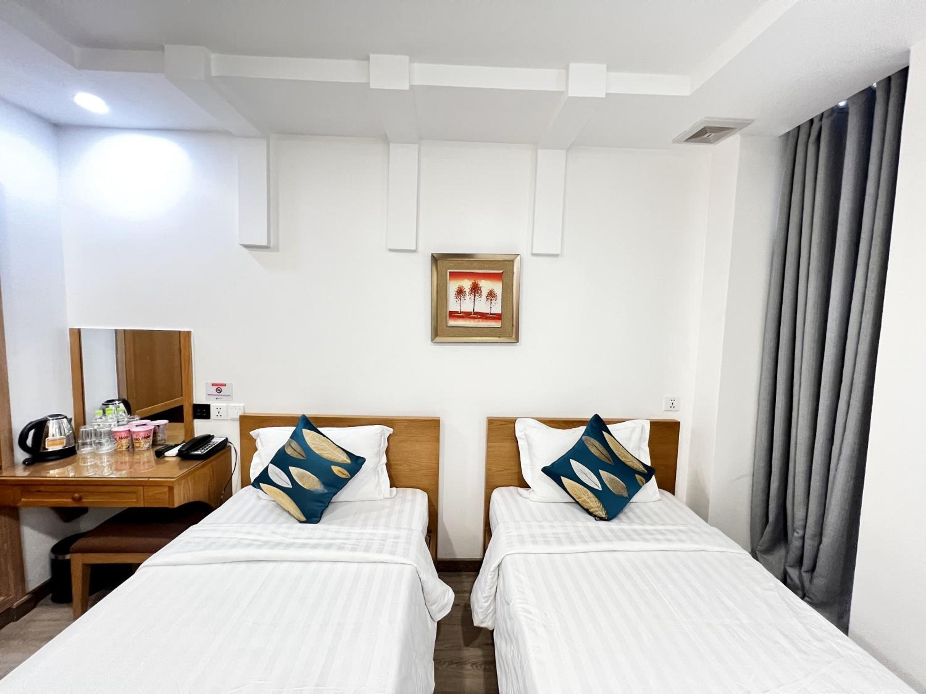 Deluxe Twin Room - Photo 12