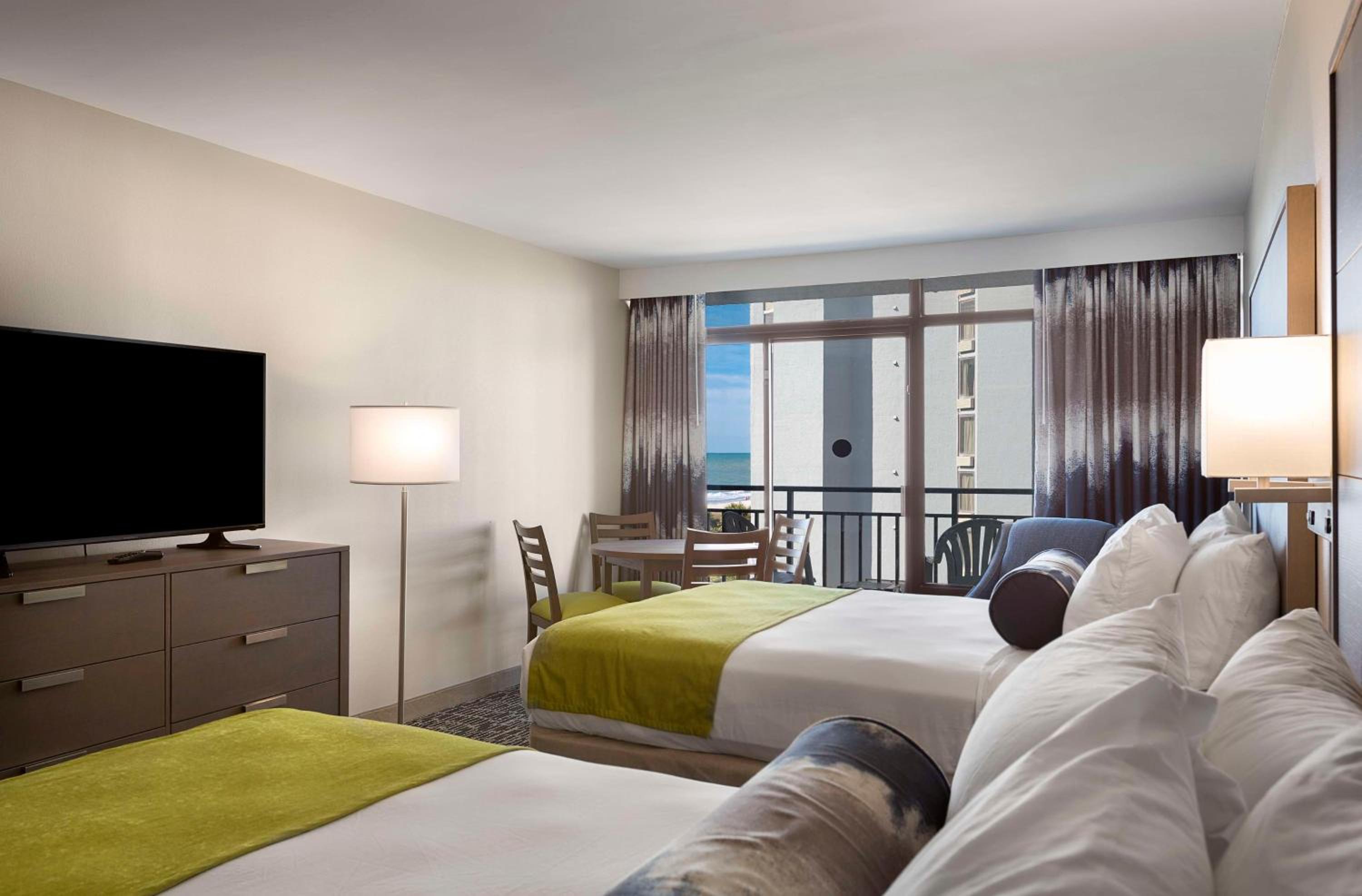 Queen Room with Two Queen Beds and Partial Ocean View - Non-Smoking - Photo 1