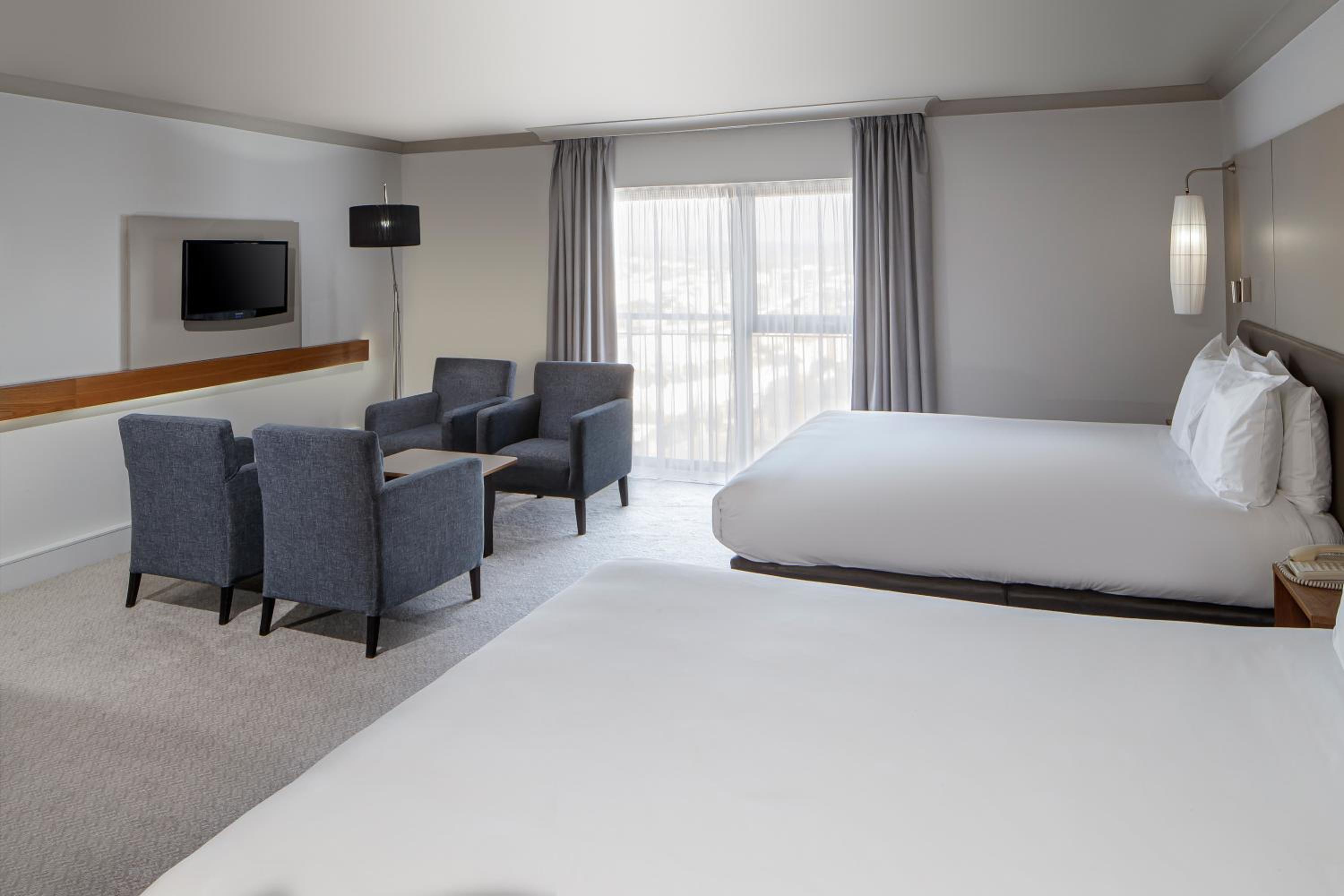 Premium Queen Room with Two Queen Beds - Photo 2
