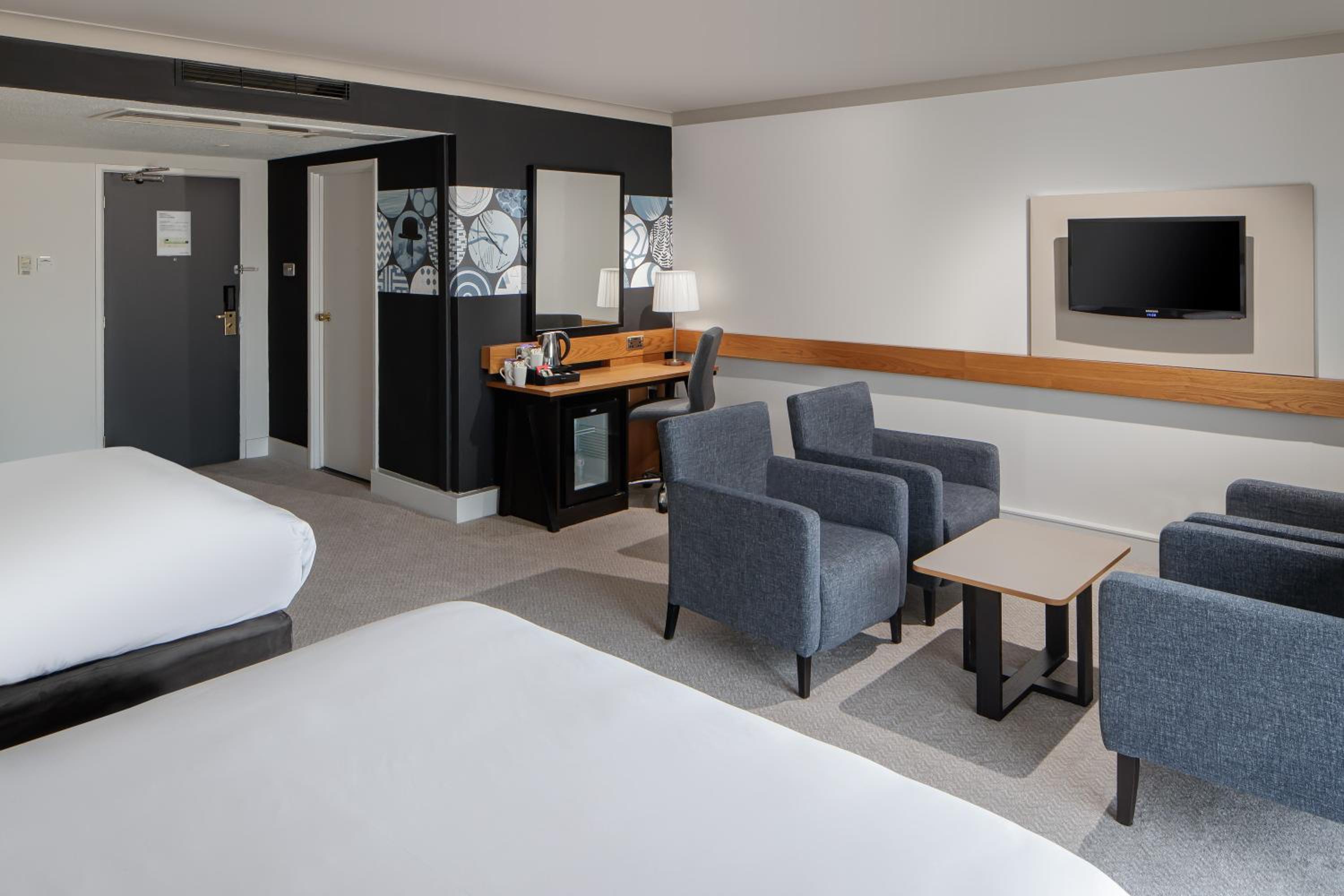 Premium Queen Room with Two Queen Beds - Photo 1