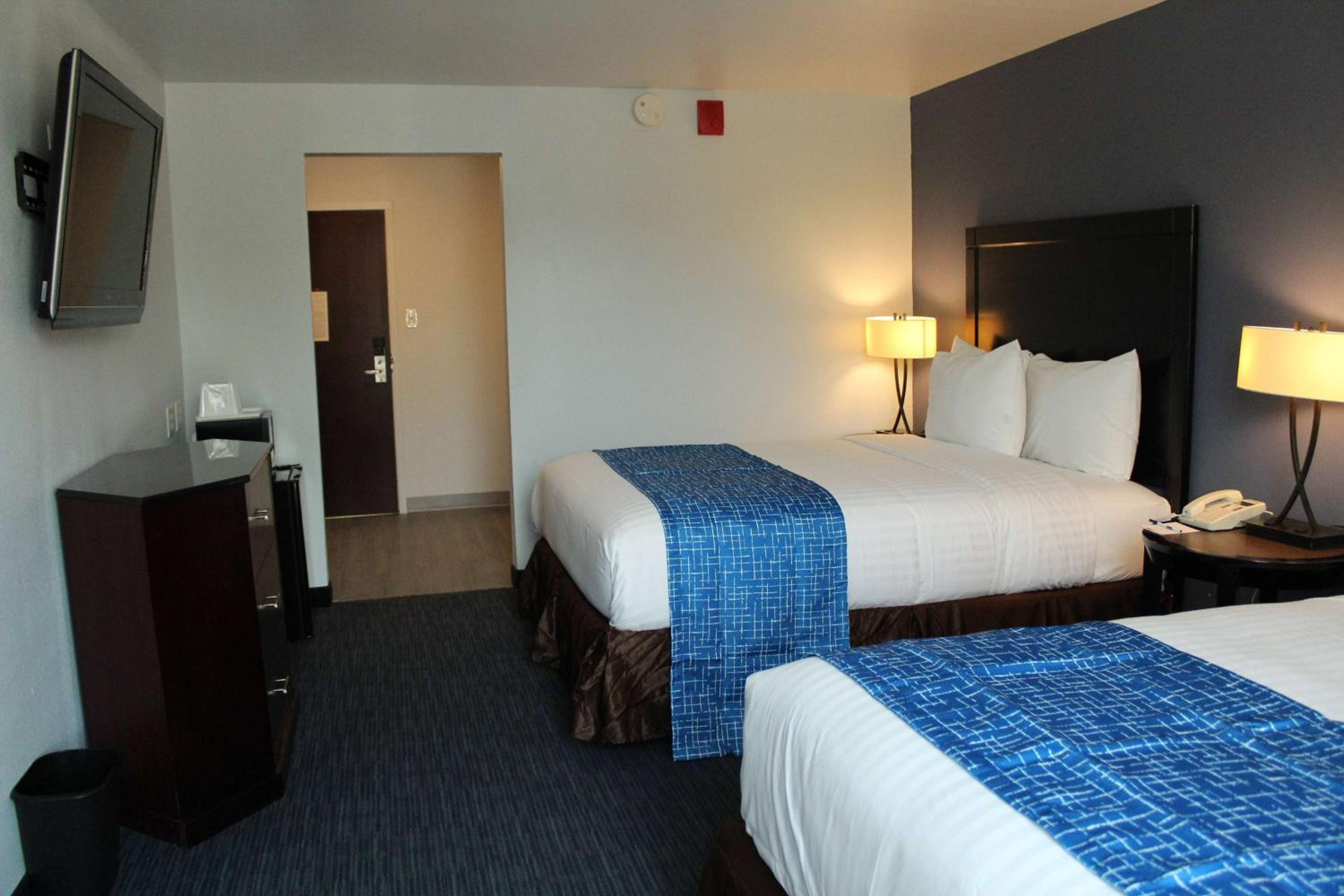 Queen Room with Two Queen Beds - Pet Friendly/Non-Smoking - Photo 1
