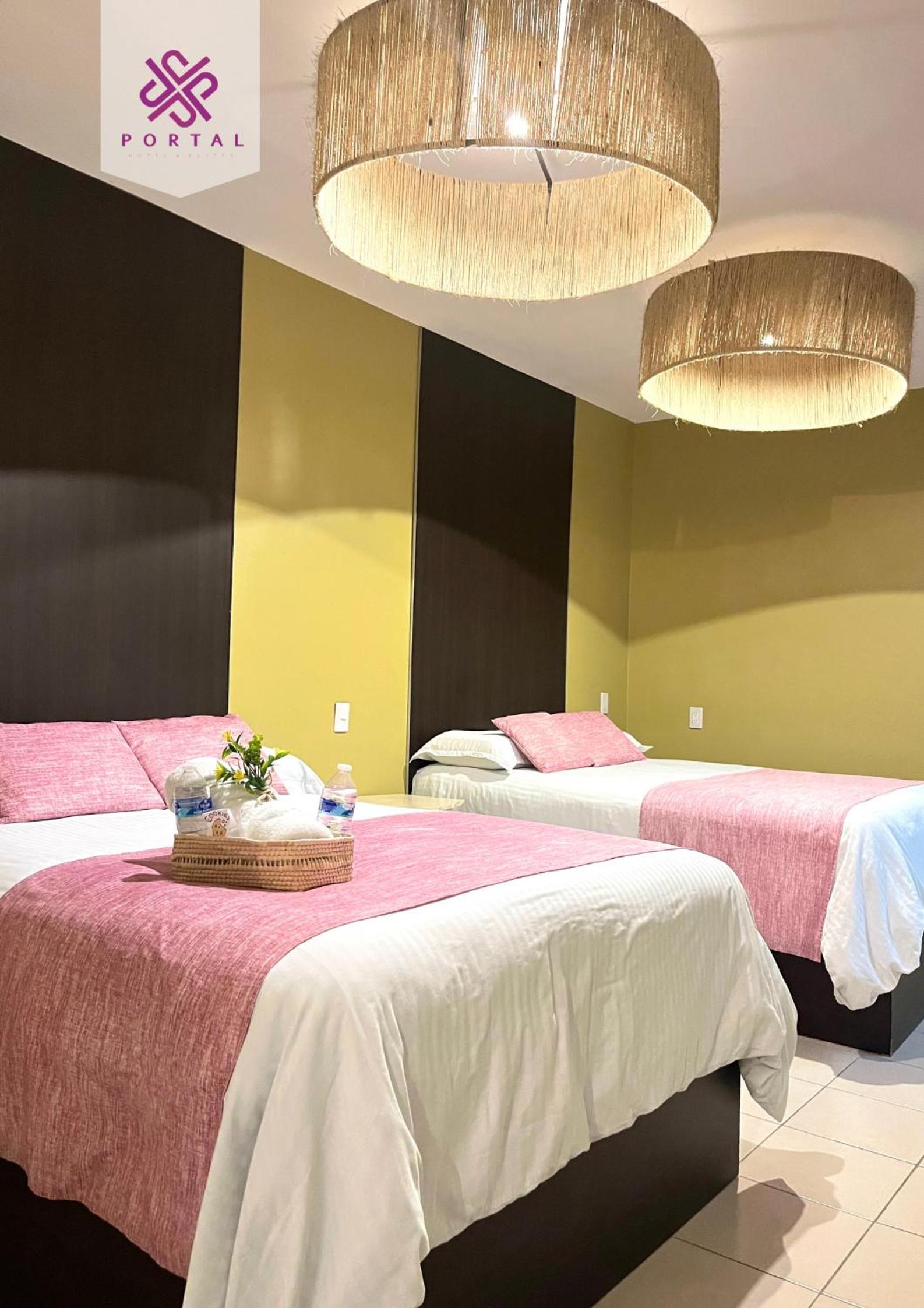 Deluxe Queen Room with Two Queen Beds photo 1
