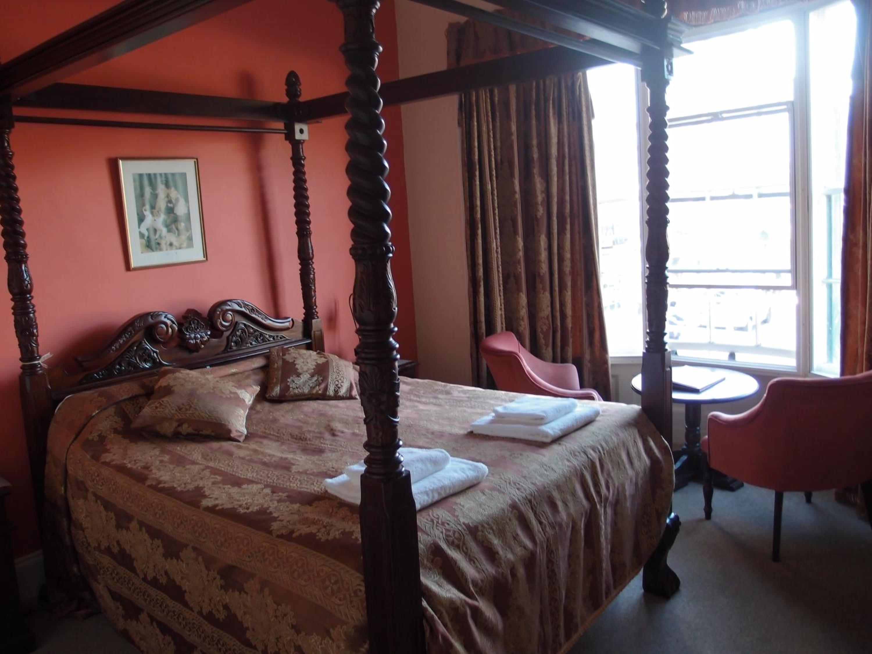 King Room with Four Poster Bed and Sea View photo 1