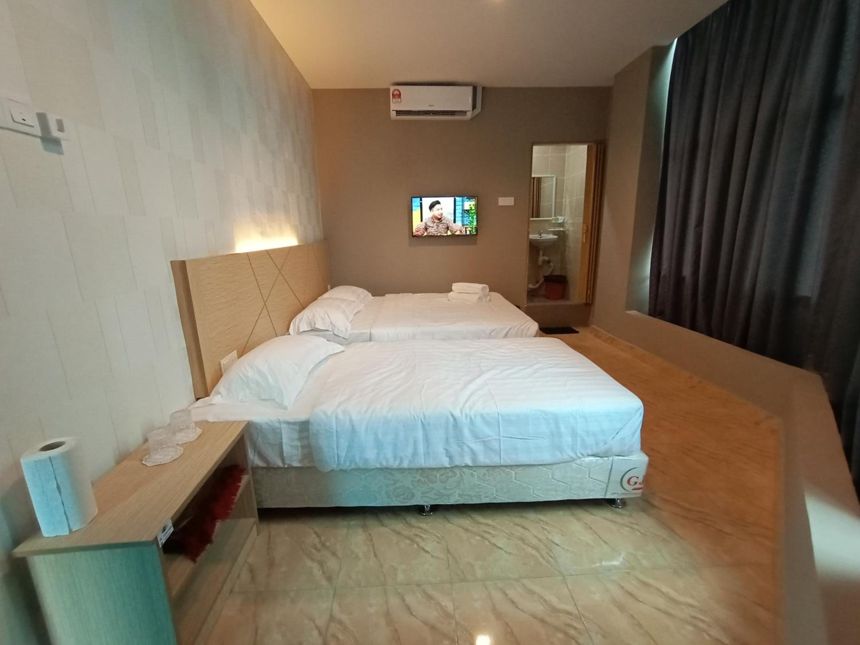 Deluxe Triple Room - Photo 1