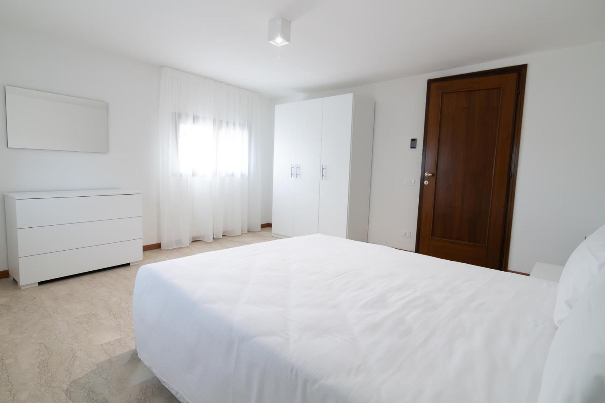 Three-Bedroom Apartment - Photo 11