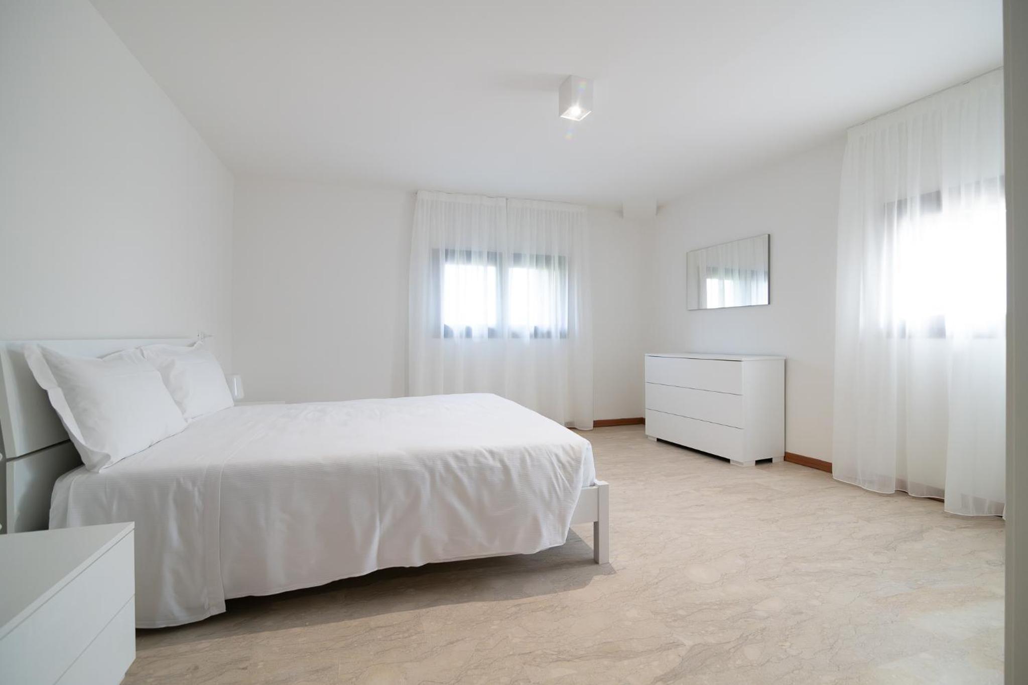 Three-Bedroom Apartment - Photo 10