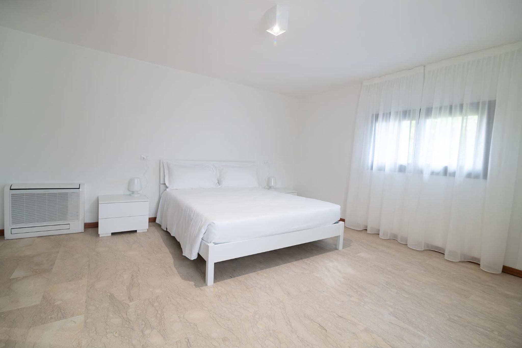 Three-Bedroom Apartment - Photo 12