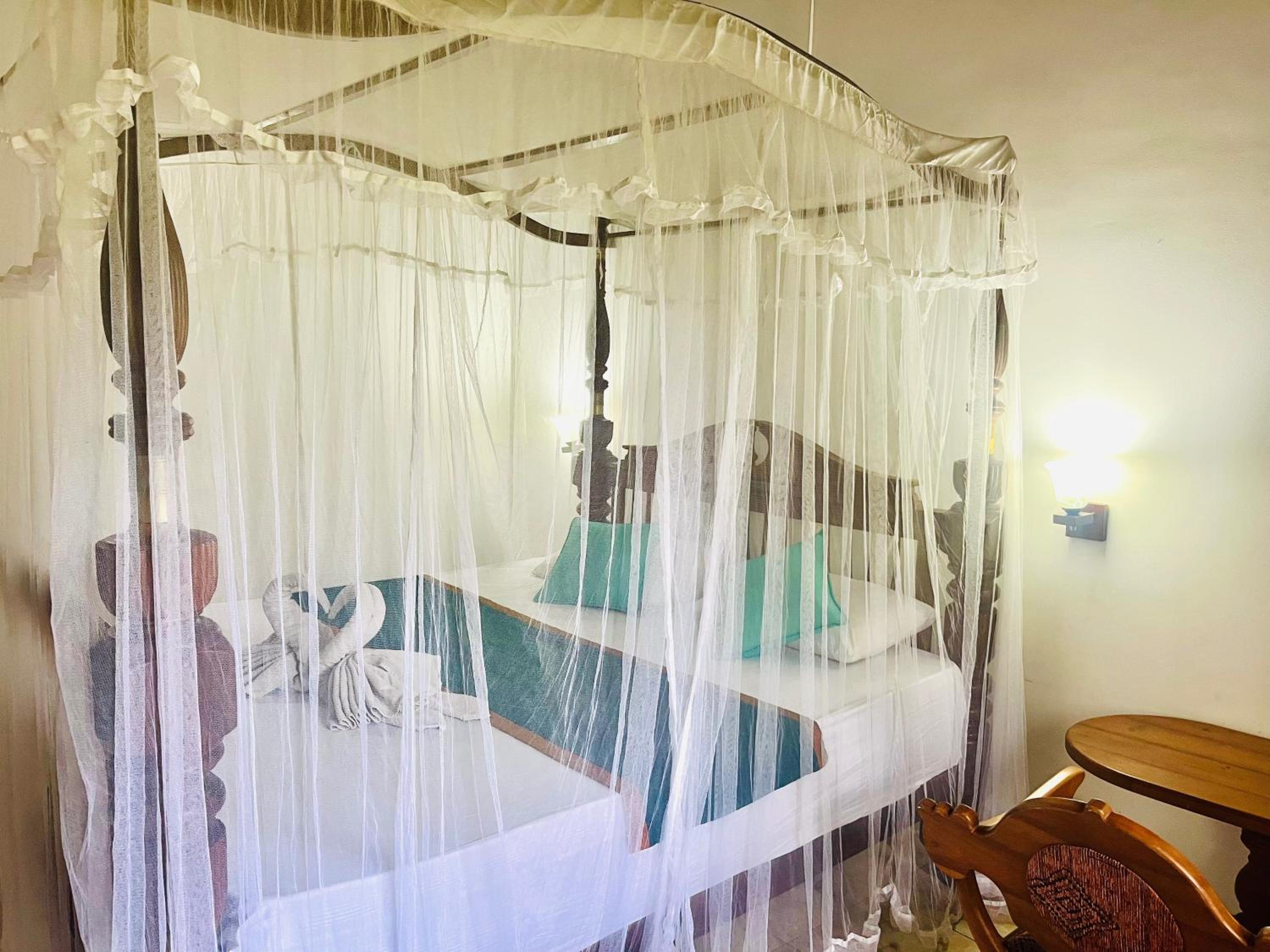 Deluxe Double Room (2 Adults + 1 Child) photo 2
