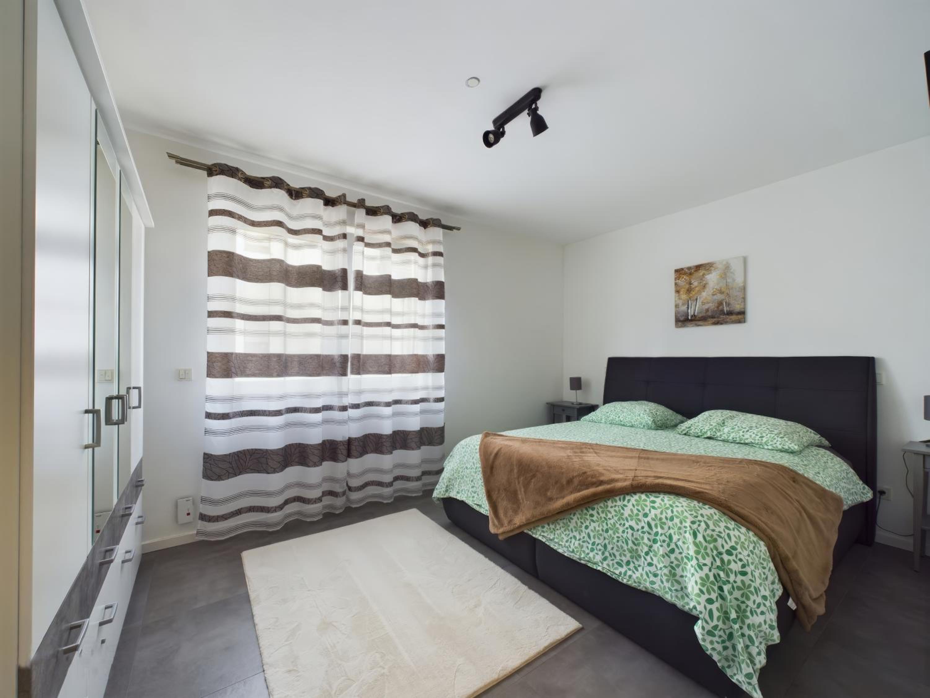 Three-Bedroom Apartment photo 1
