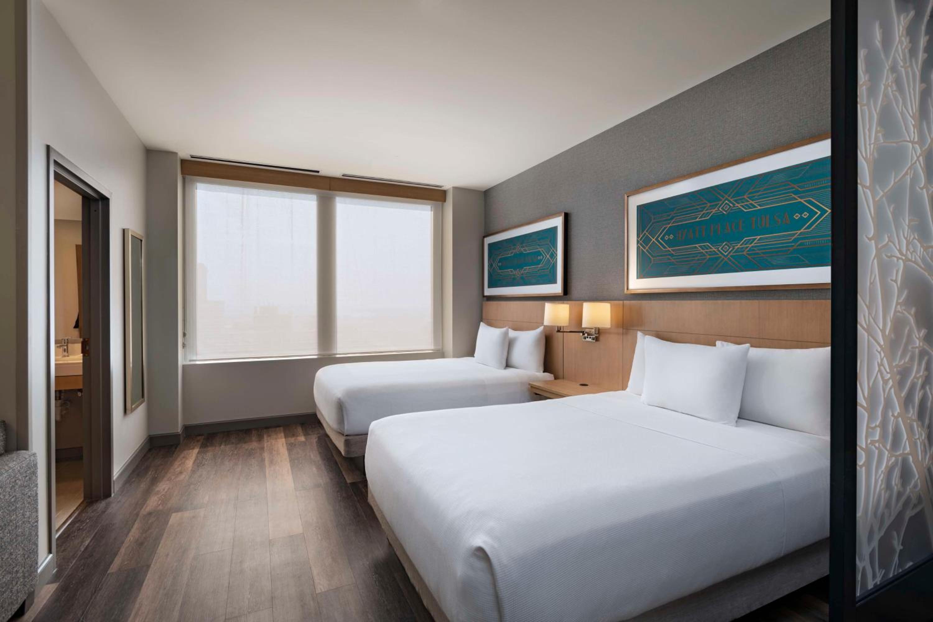 Queen Room with Two Queen Beds, Sofa Bed and Accessible Tub - Photo 1
