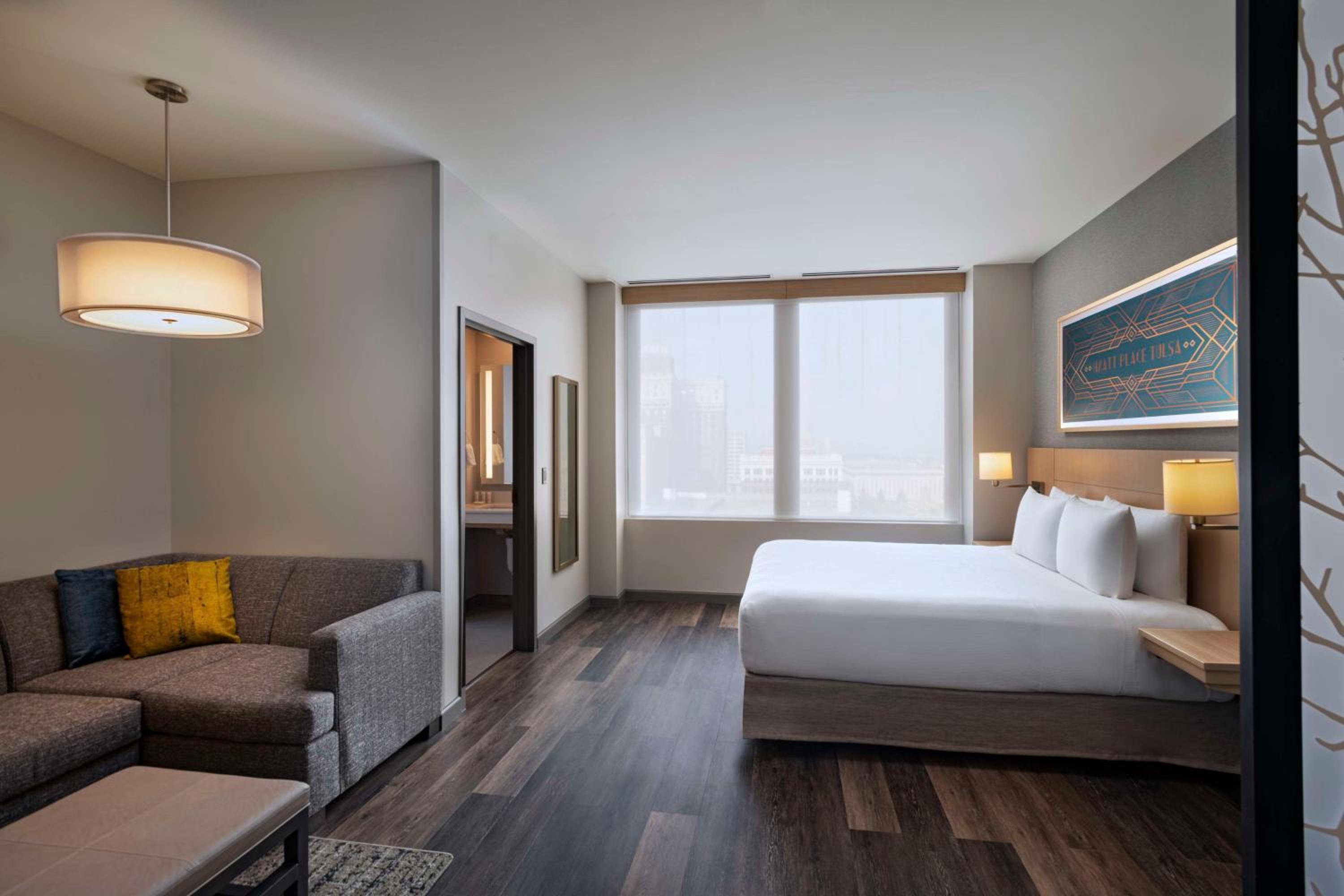 Specialty Corner King Room with Sofa Bed - Photo 1