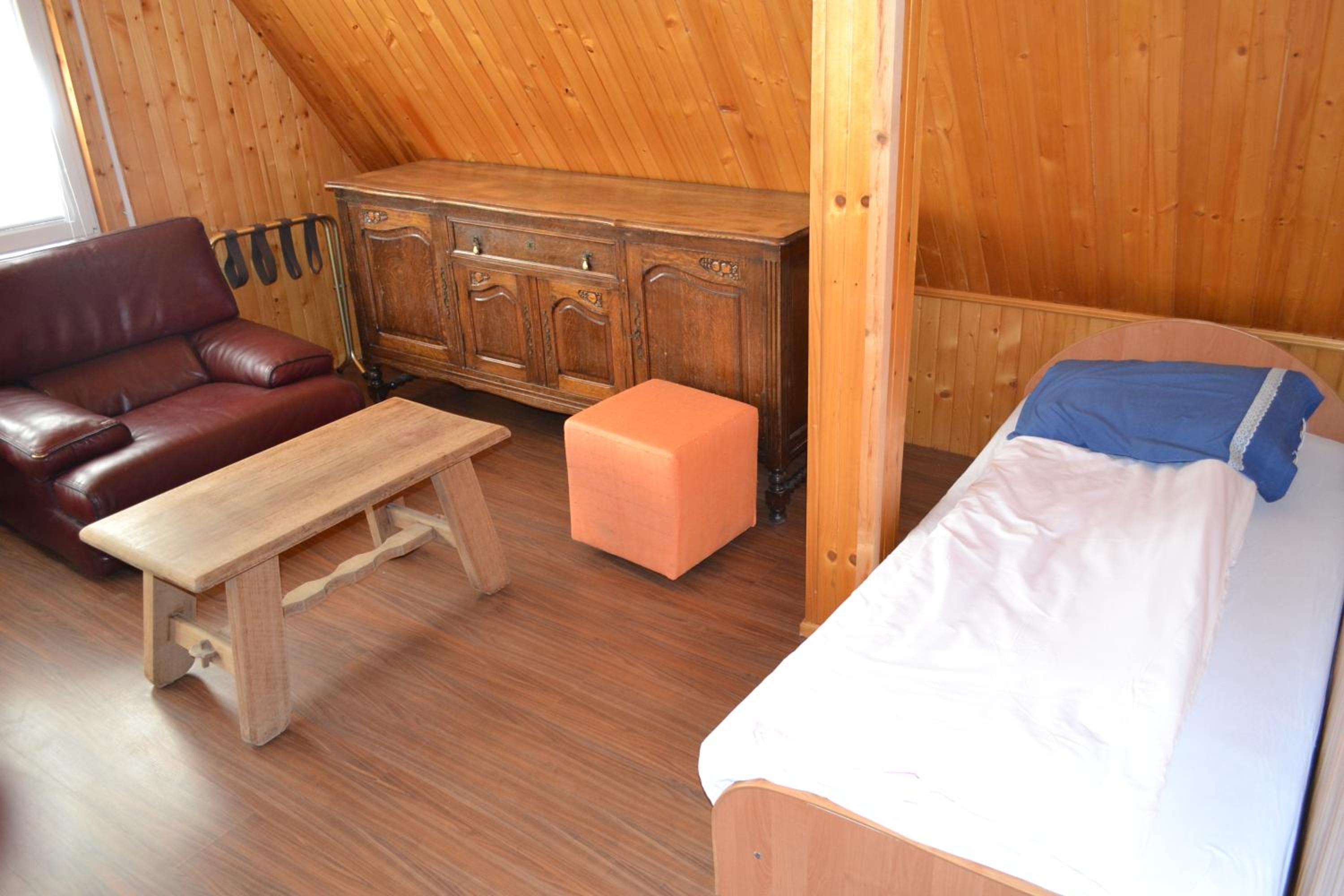  Basic Family Room With Shared Bathroom  photo 1