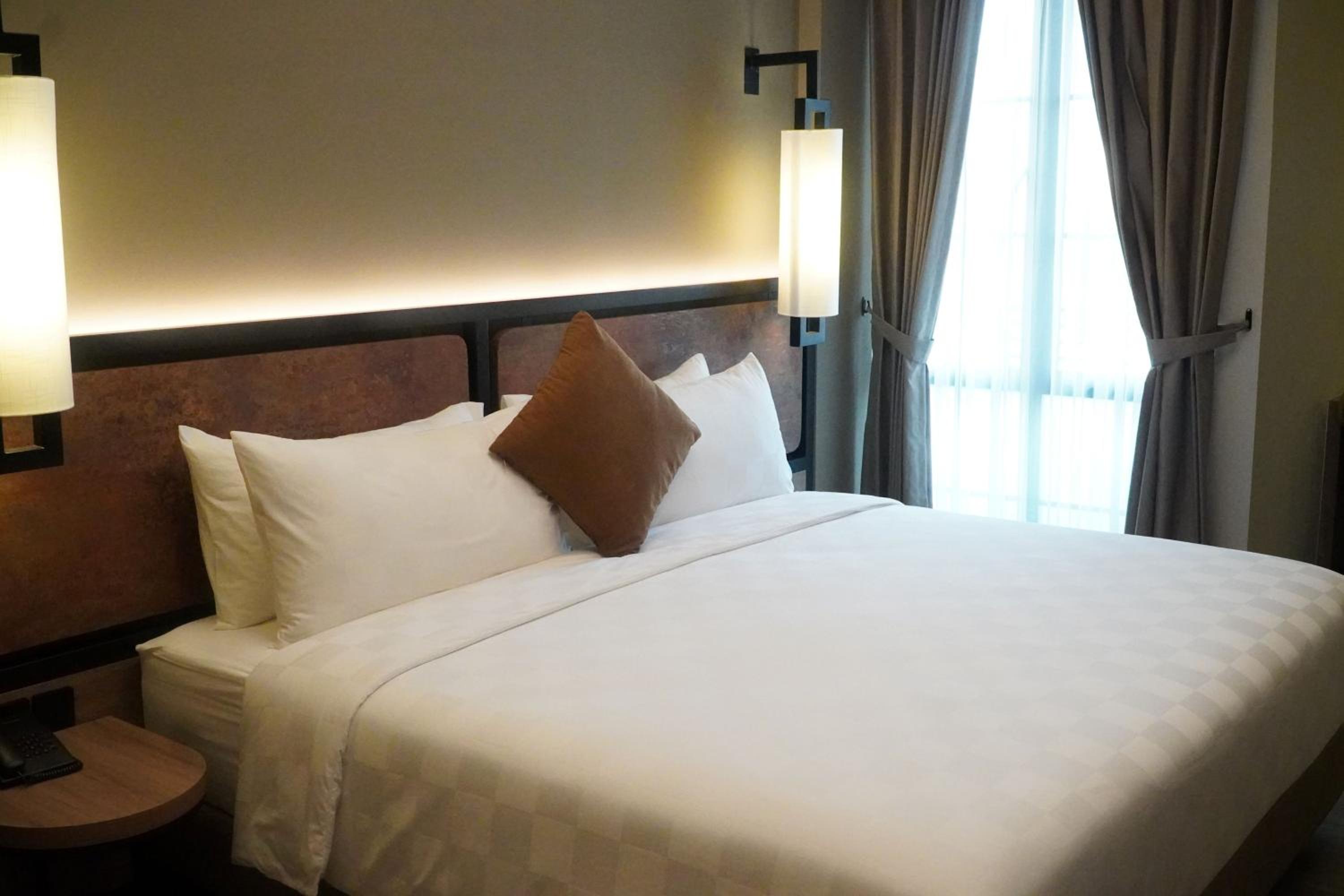 King Suite with Balcony - Photo 1