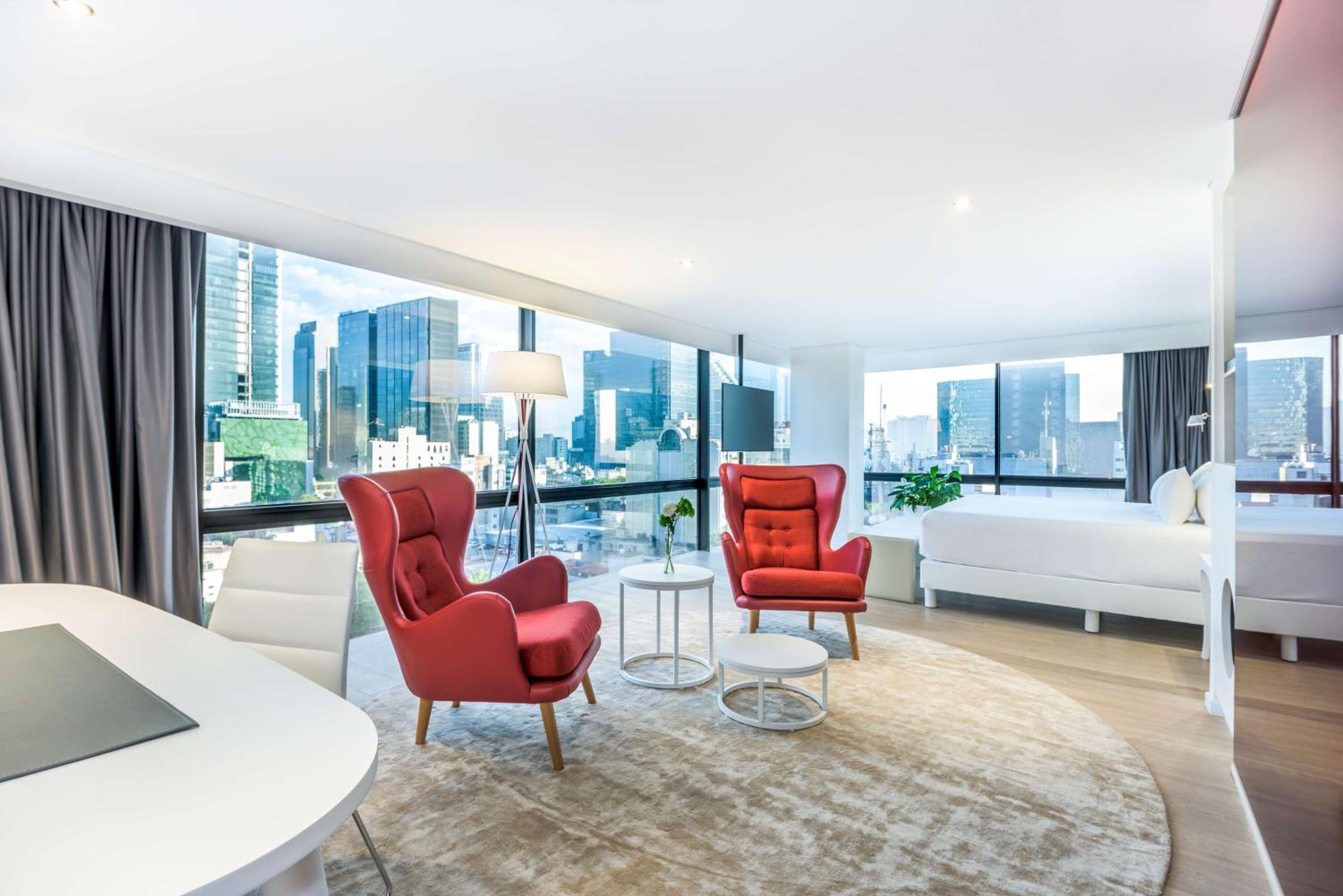 Junior Suite Corner View - Photo 1