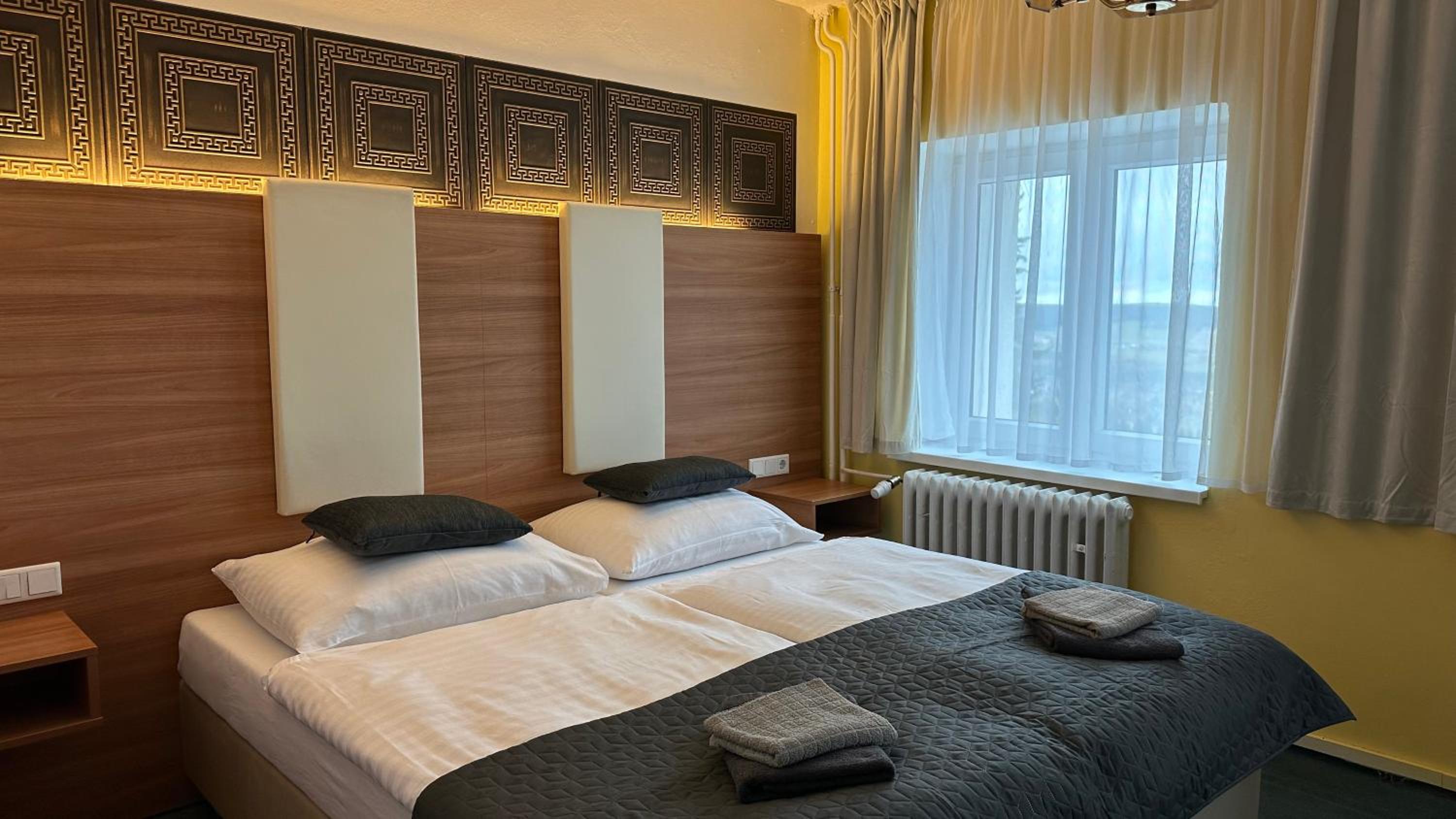 Economy Triple Room photo 1