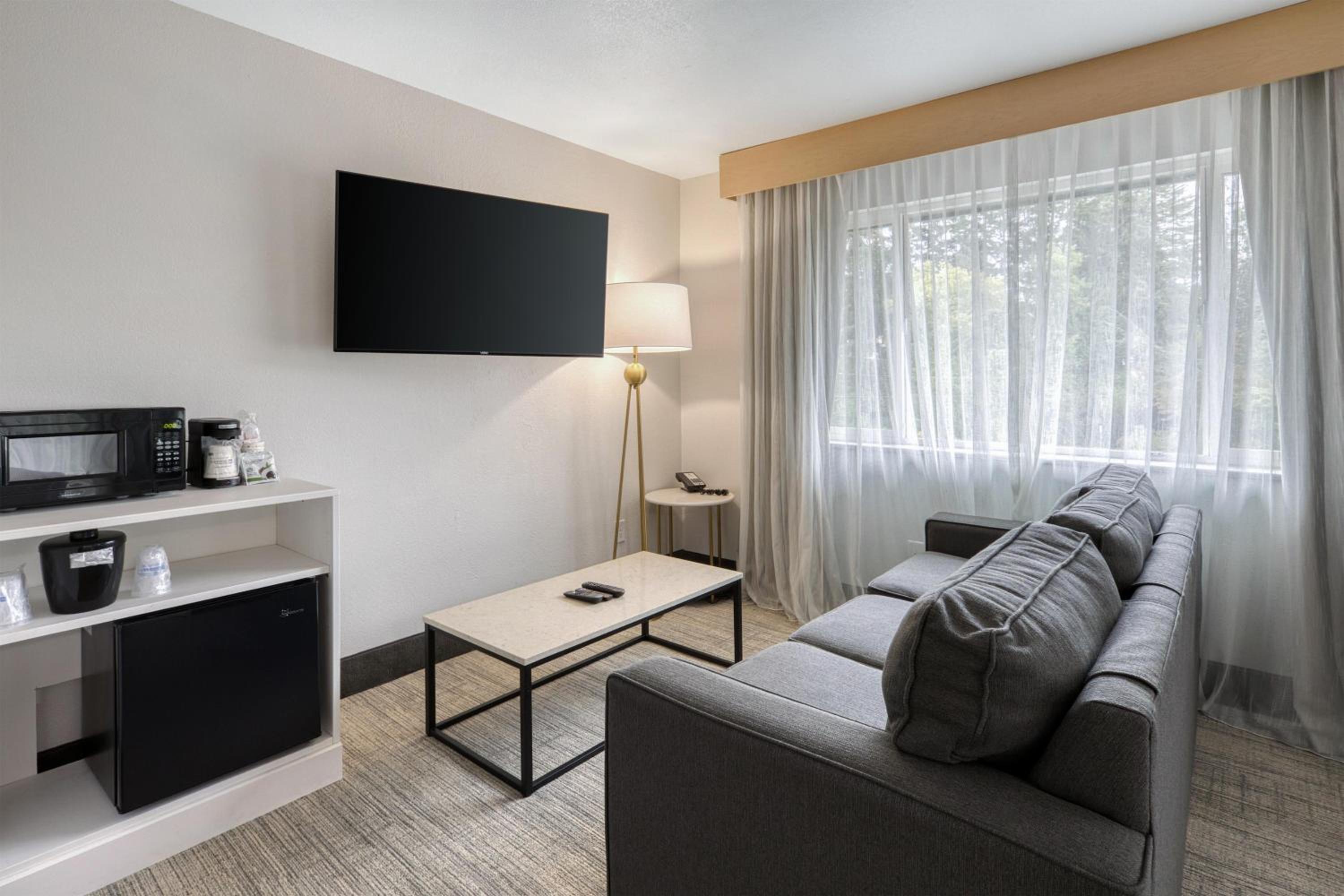 King Suite with Balcony and Courtyard View - Non-Smoking