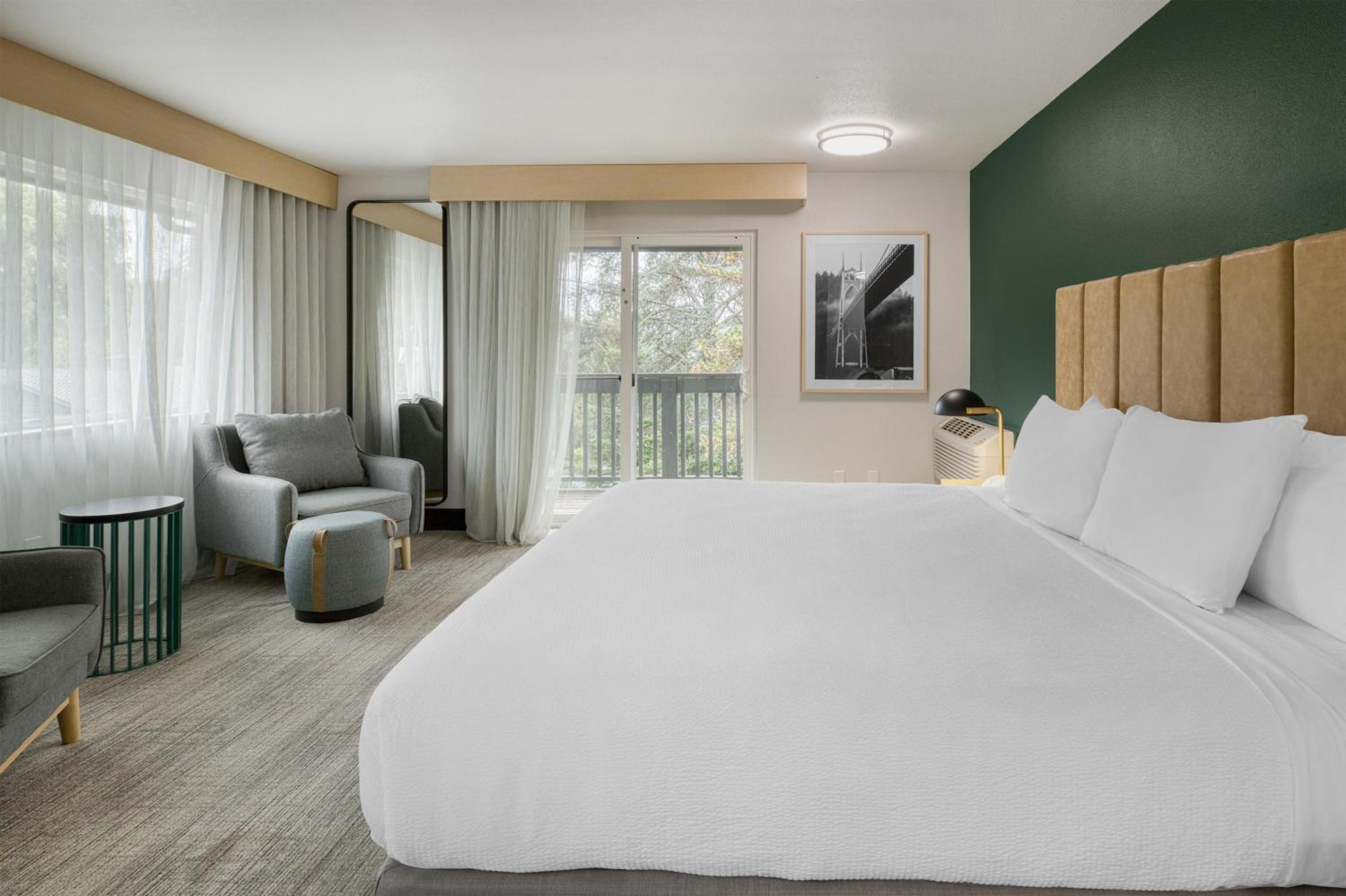 King Suite with Balcony and Courtyard View - Non-Smoking