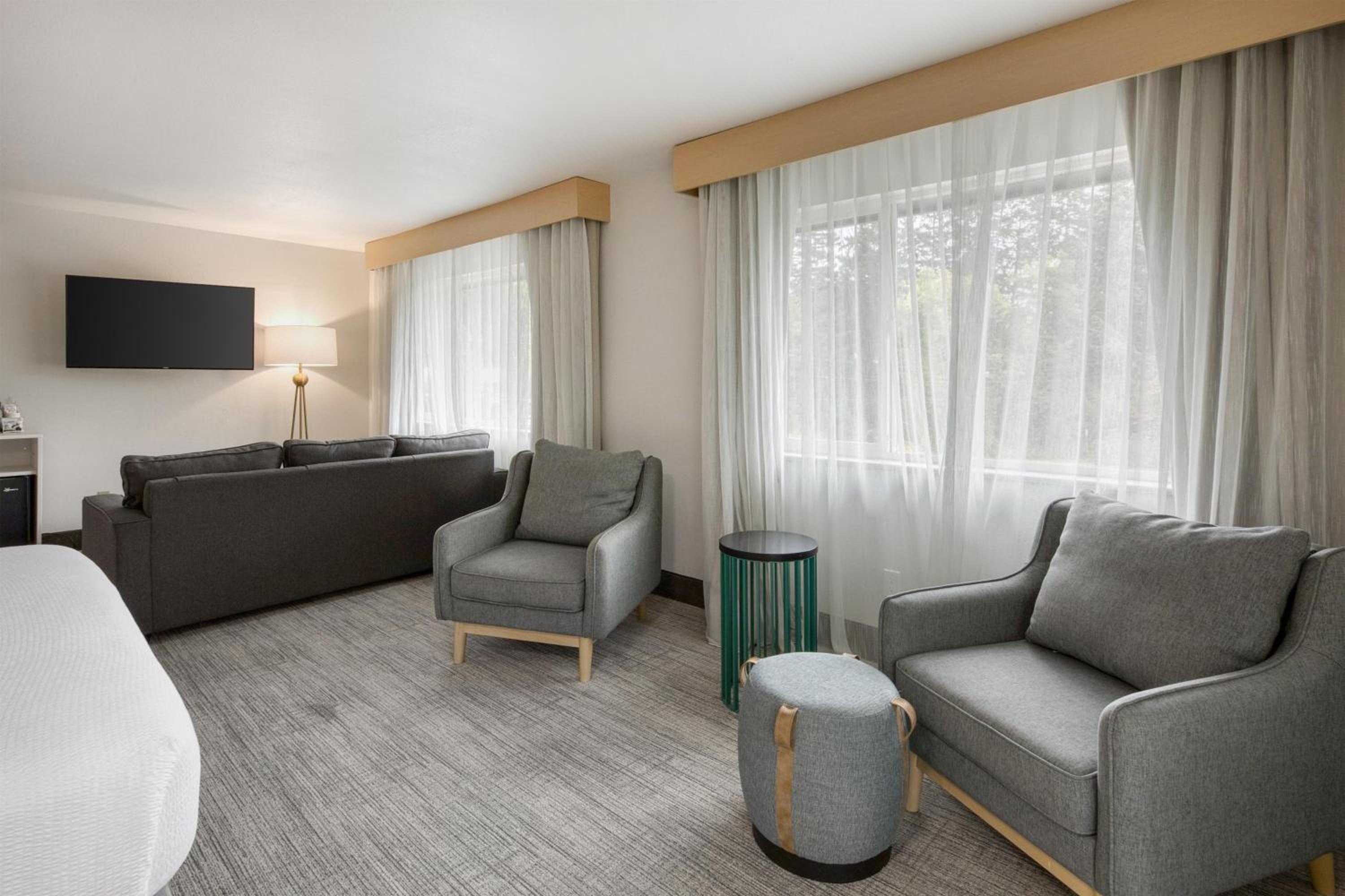 King Suite with Balcony and Courtyard View - Non-Smoking