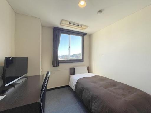 Single Room With Shared Shower And Toilet
