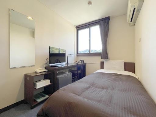 Single Room With Shared Shower And Toilet