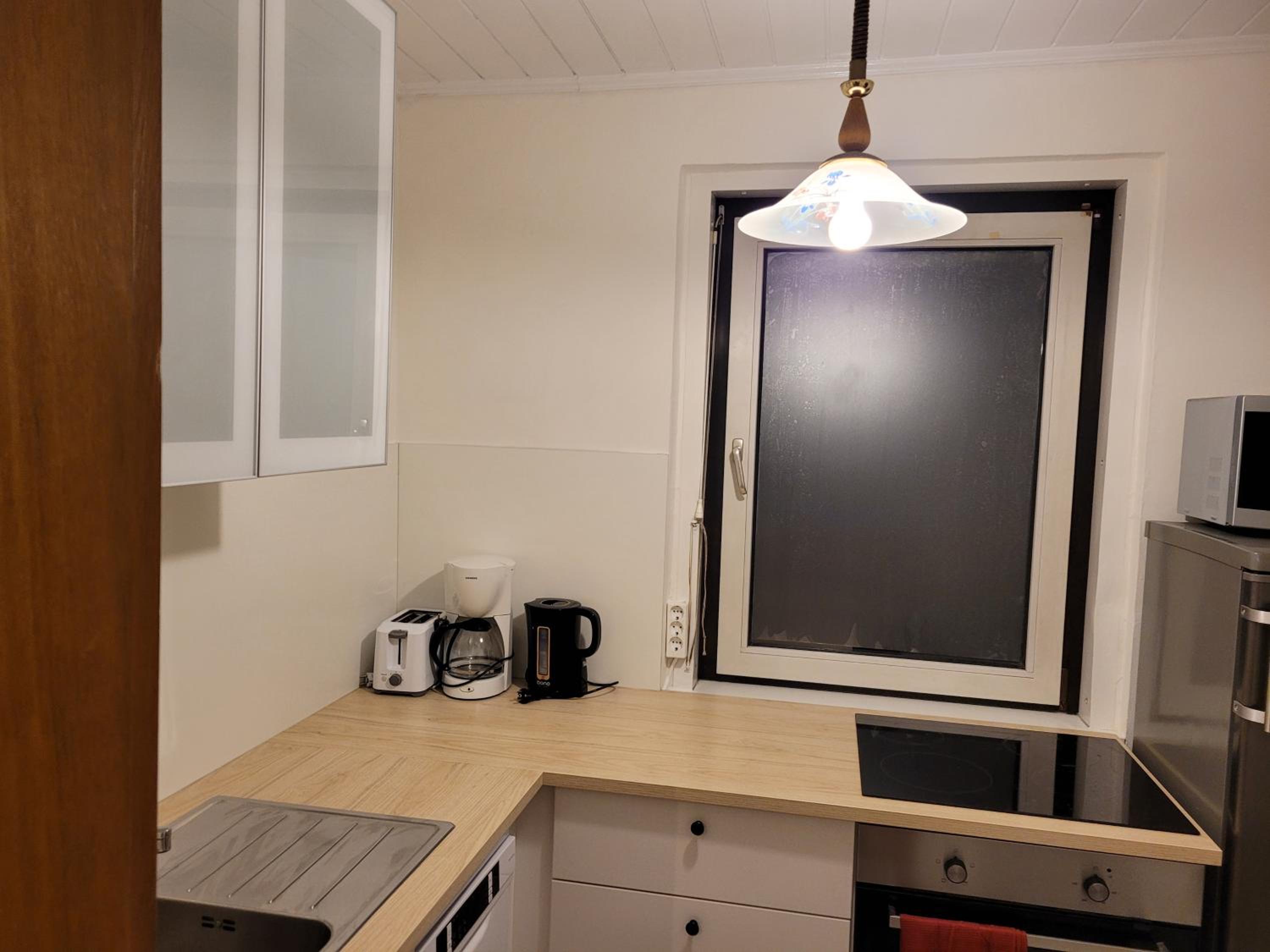 Three-Bedroom Apartment - Photo 12