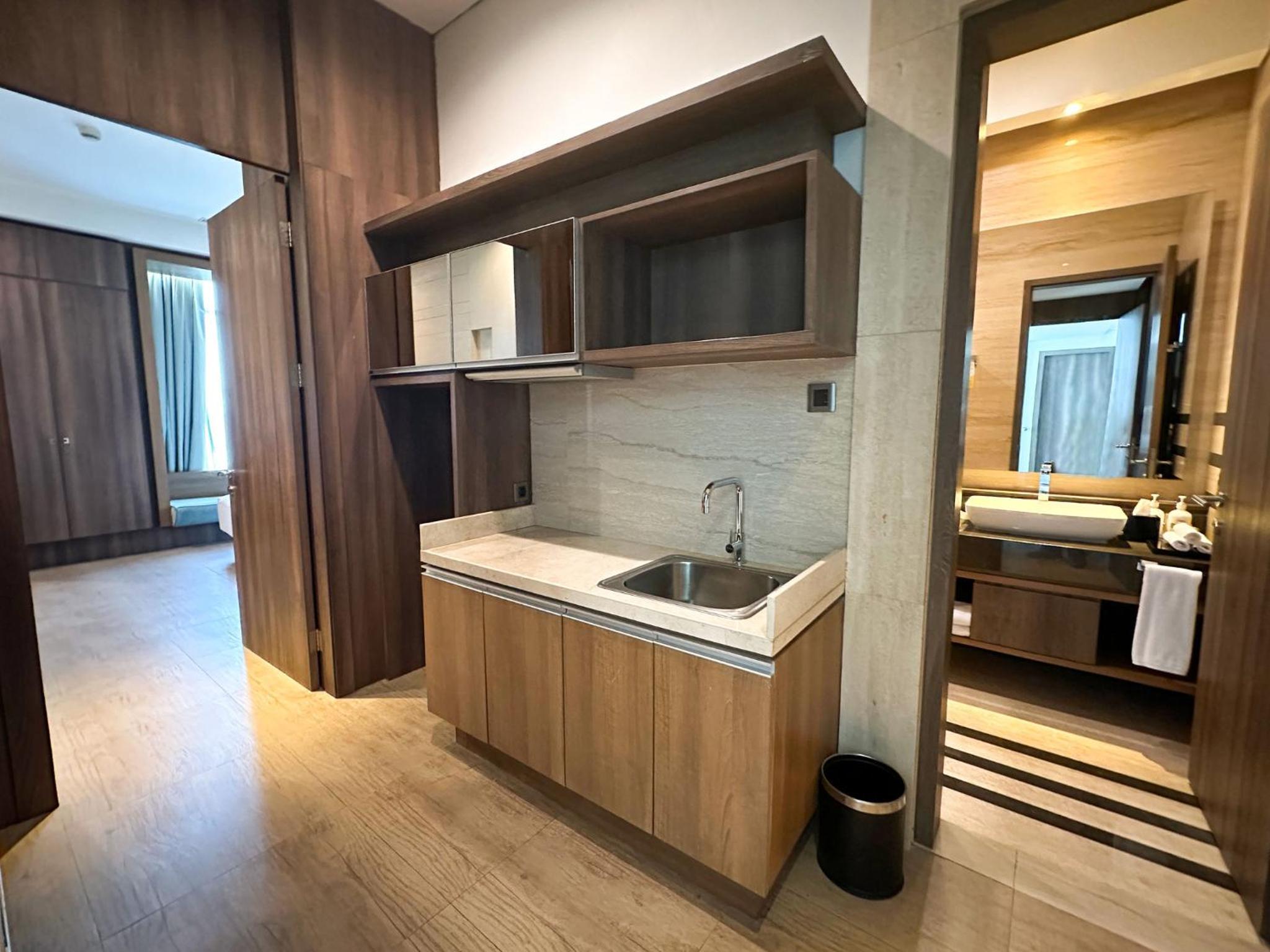 King Suite with Three King Beds and City View photo 2