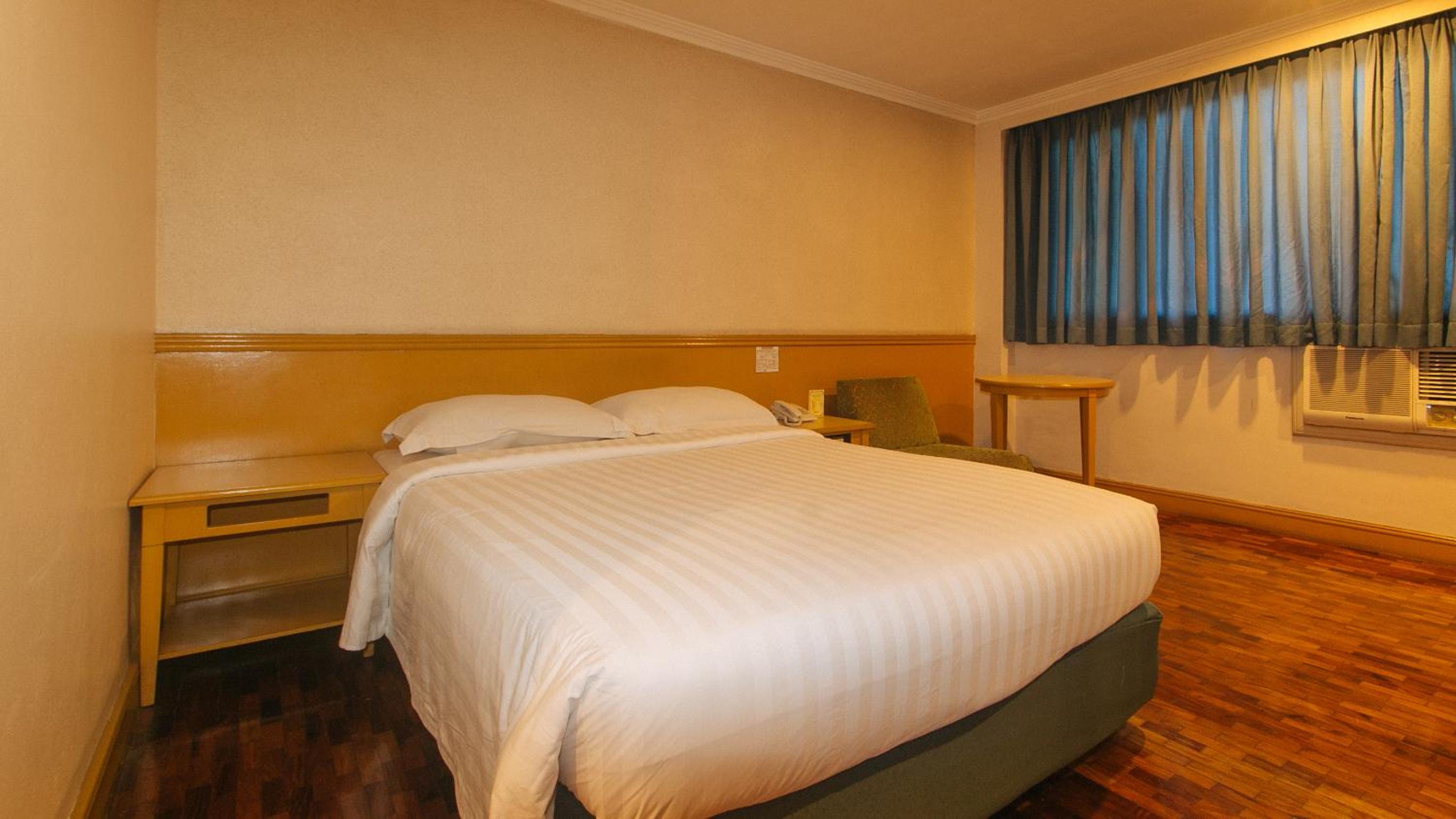 Deluxe Room - Photo 1