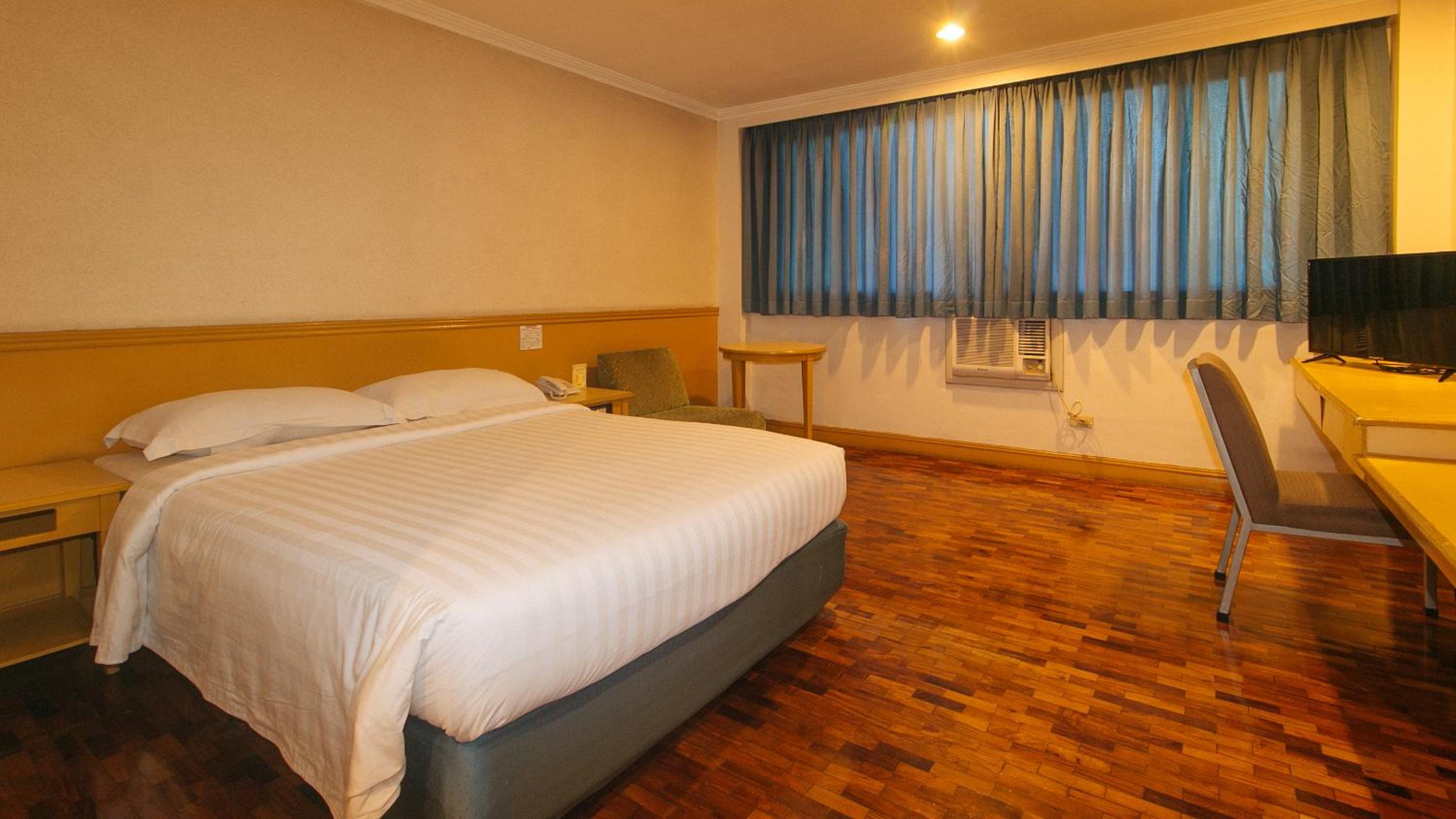 Deluxe Room - Photo 2