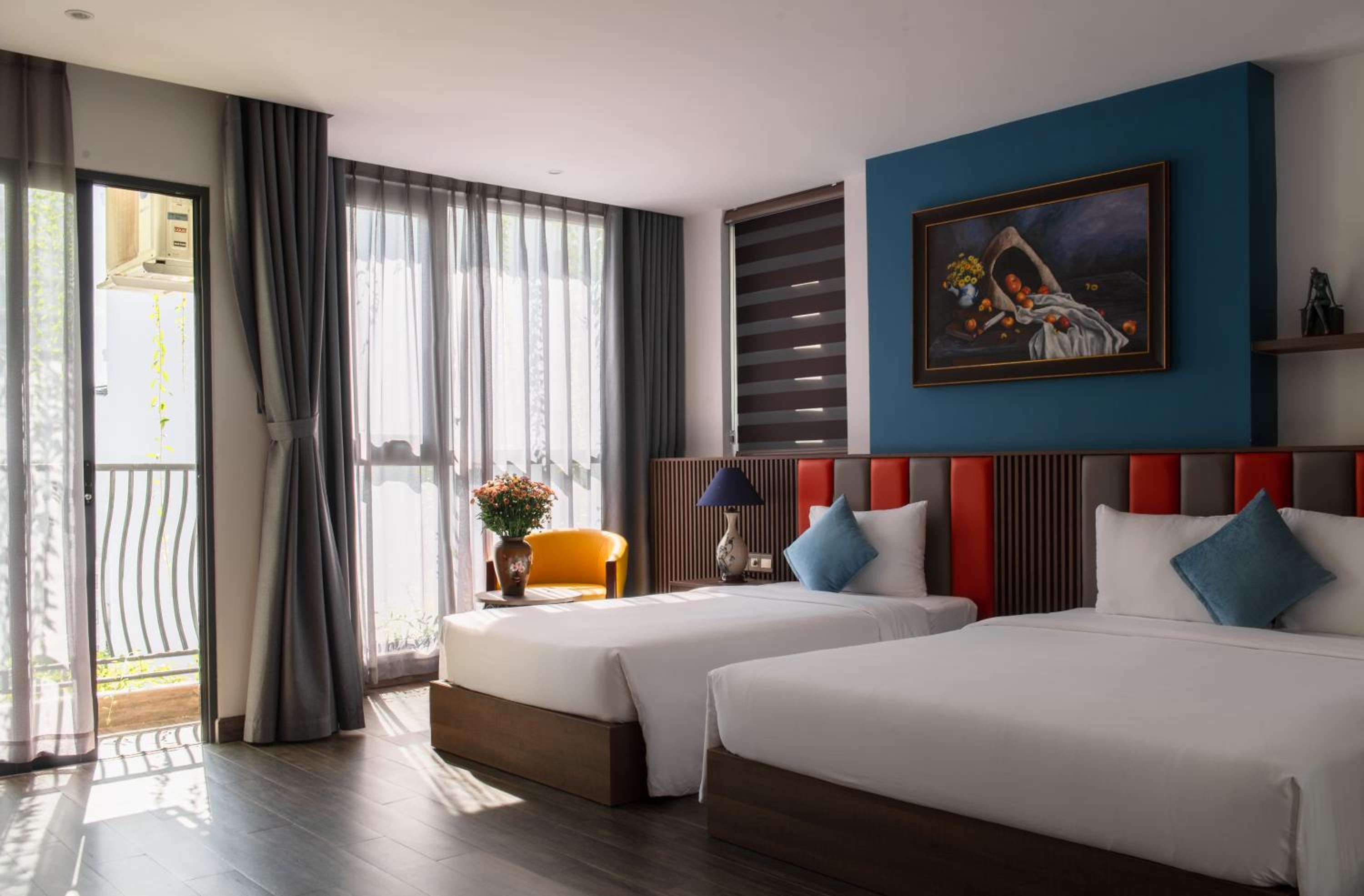 Deluxe Triple Room - Photo 11