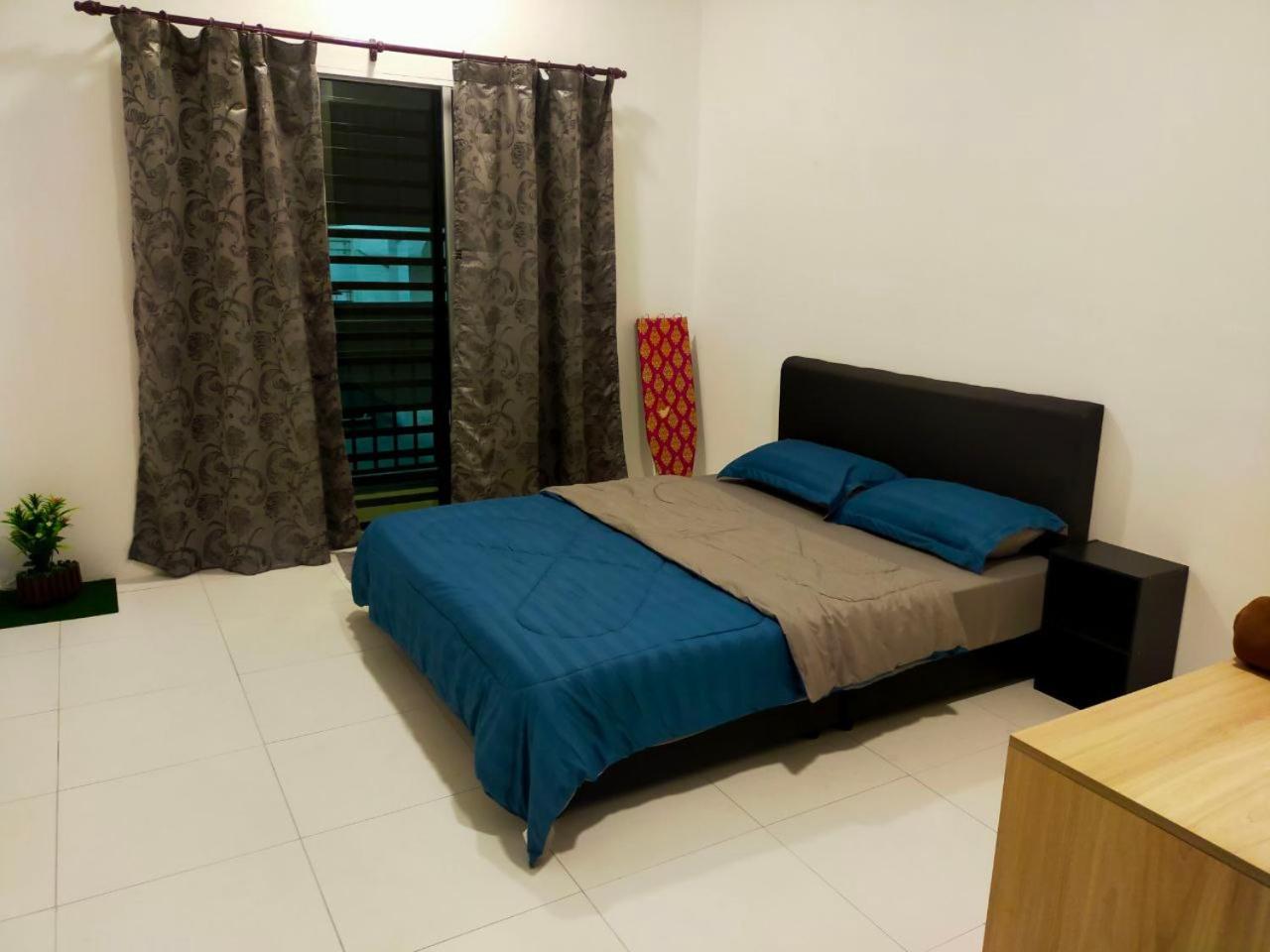 Three-Bedroom Apartment photo 1
