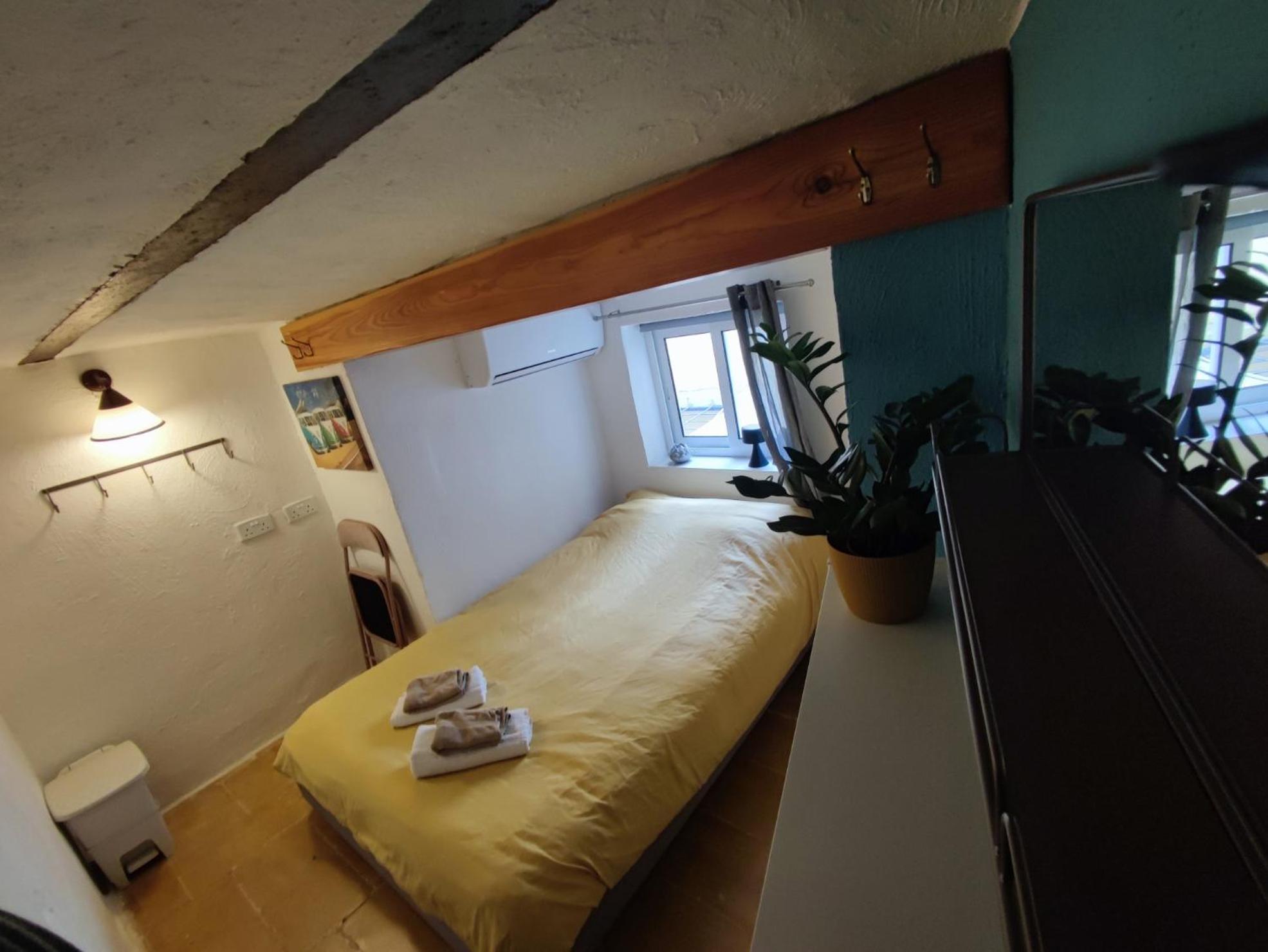 Single Room with Shared Shower and Toilet