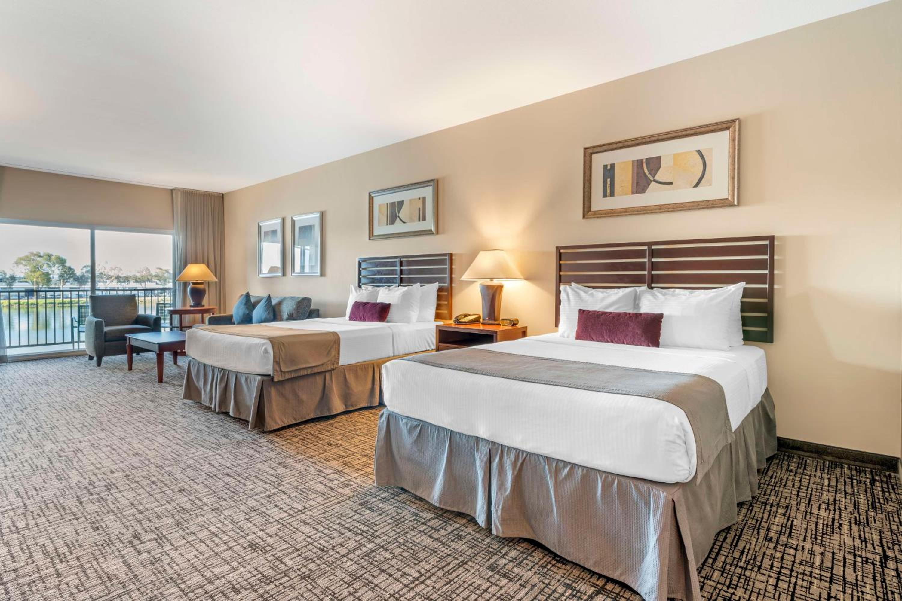 Large Queen Room with Two Queen Beds with Balcony - Water View photo 1