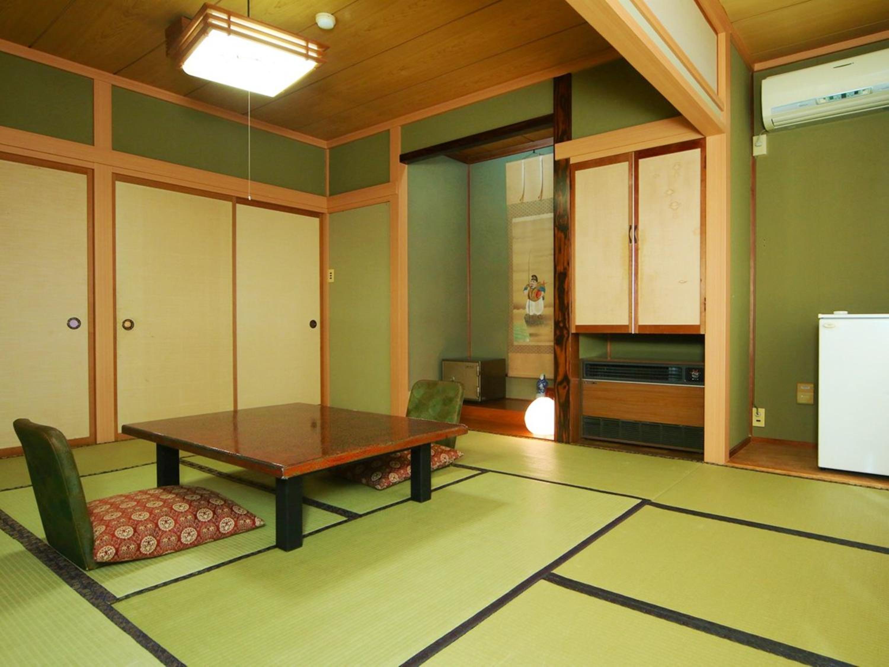 Quadruple Room with Shared Bathroom