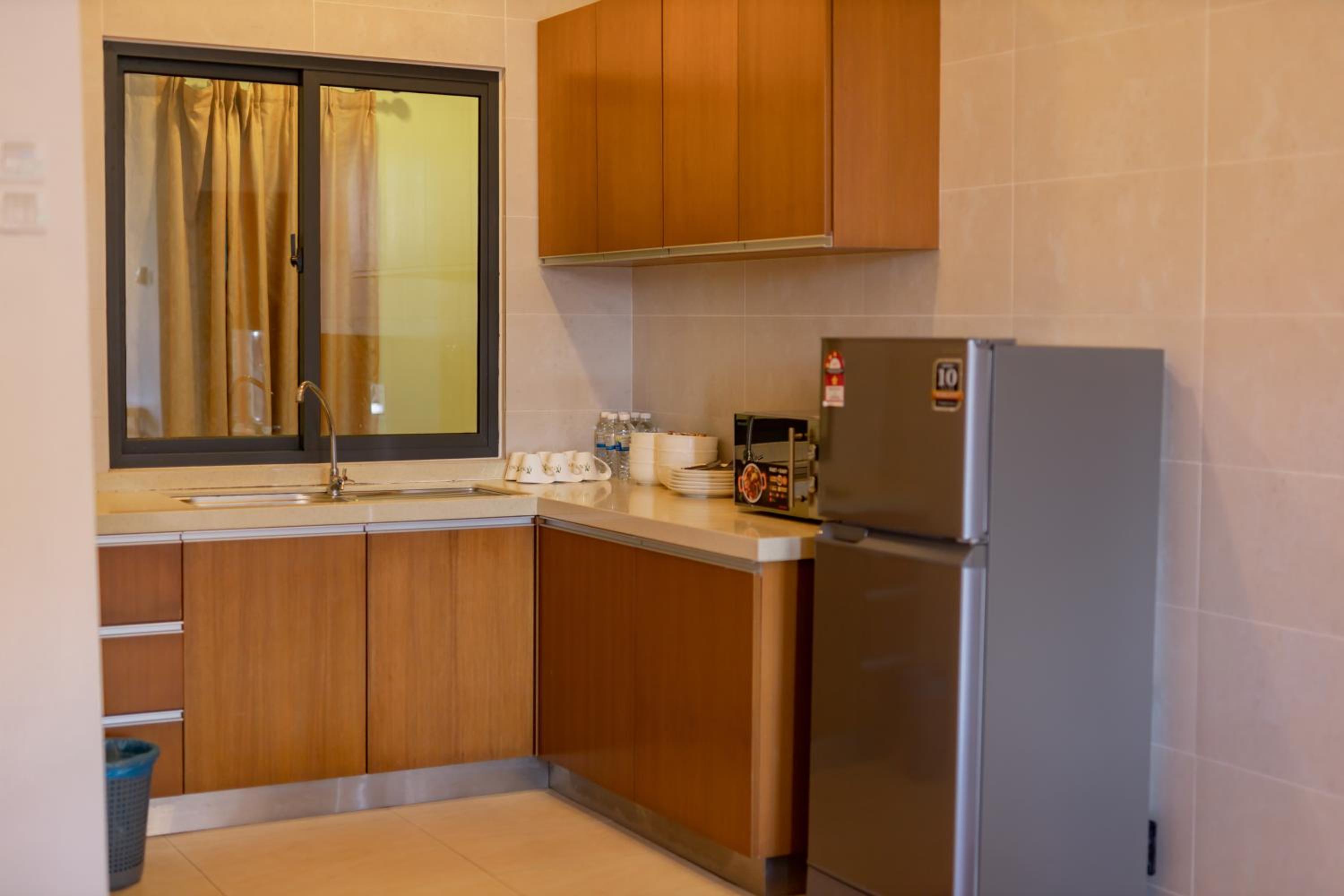 Three-Bedroom Apartment - Photo 5