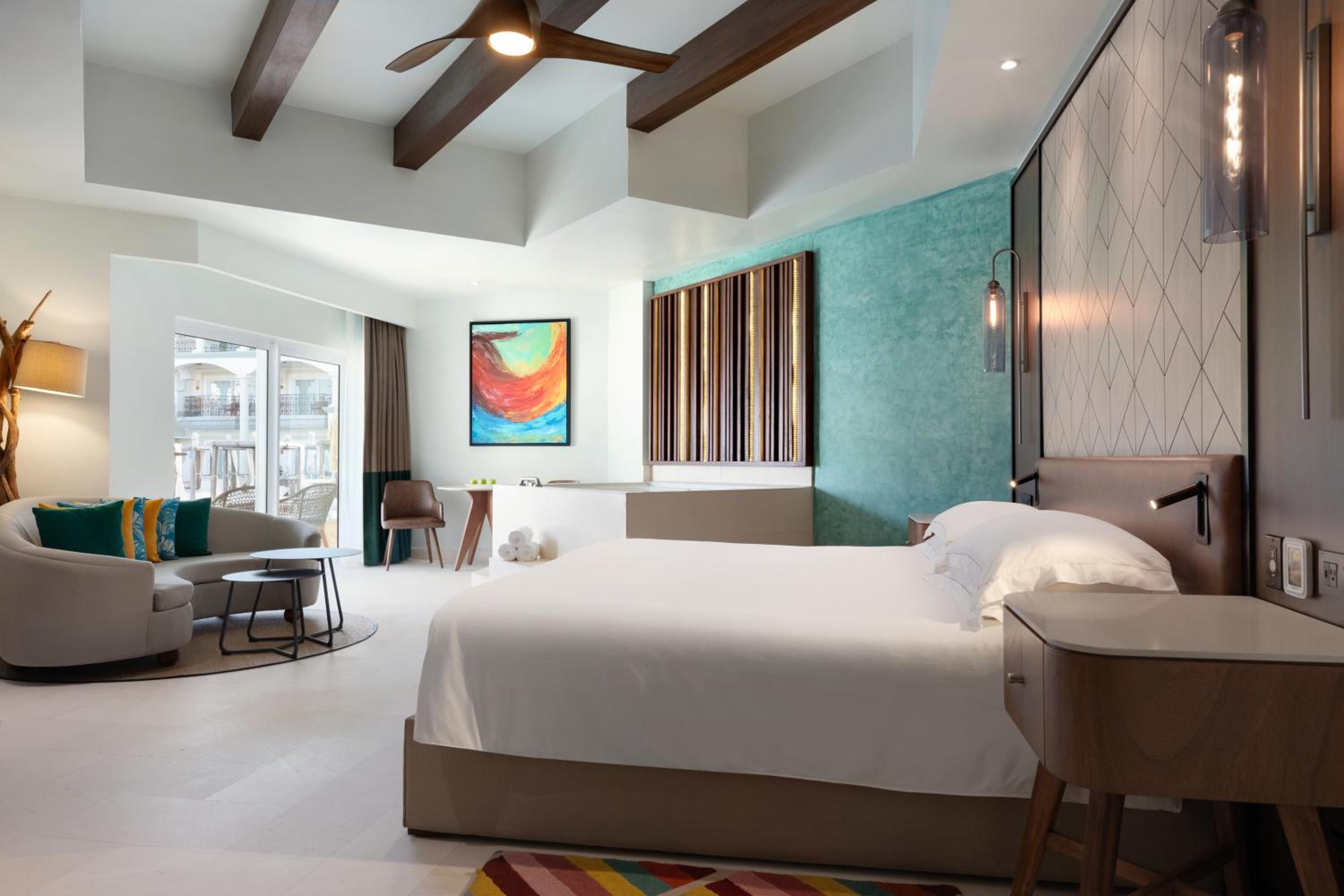 King Suite with Balcony and Pool View