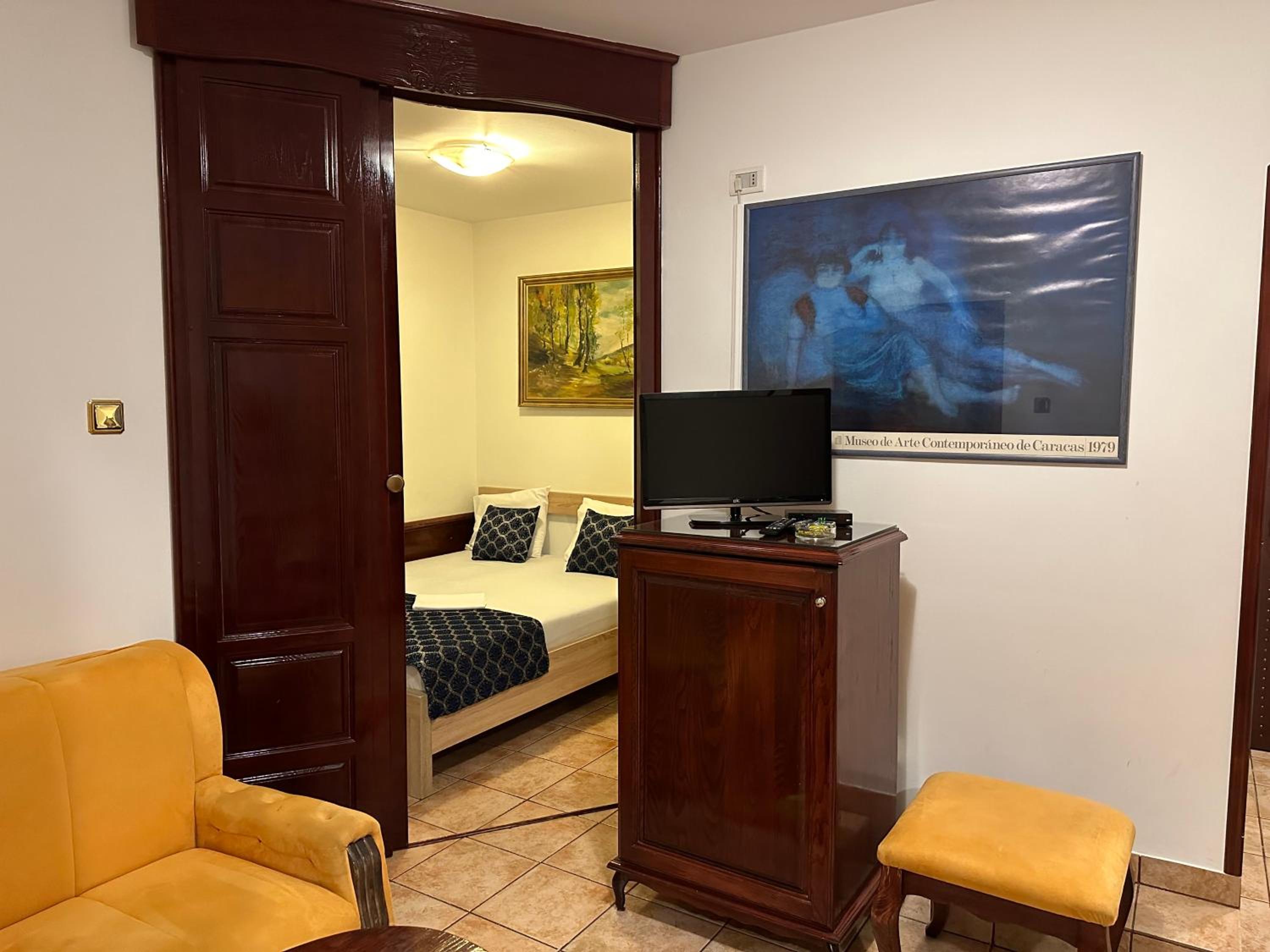 Quadruple Room with Balcony photo 2