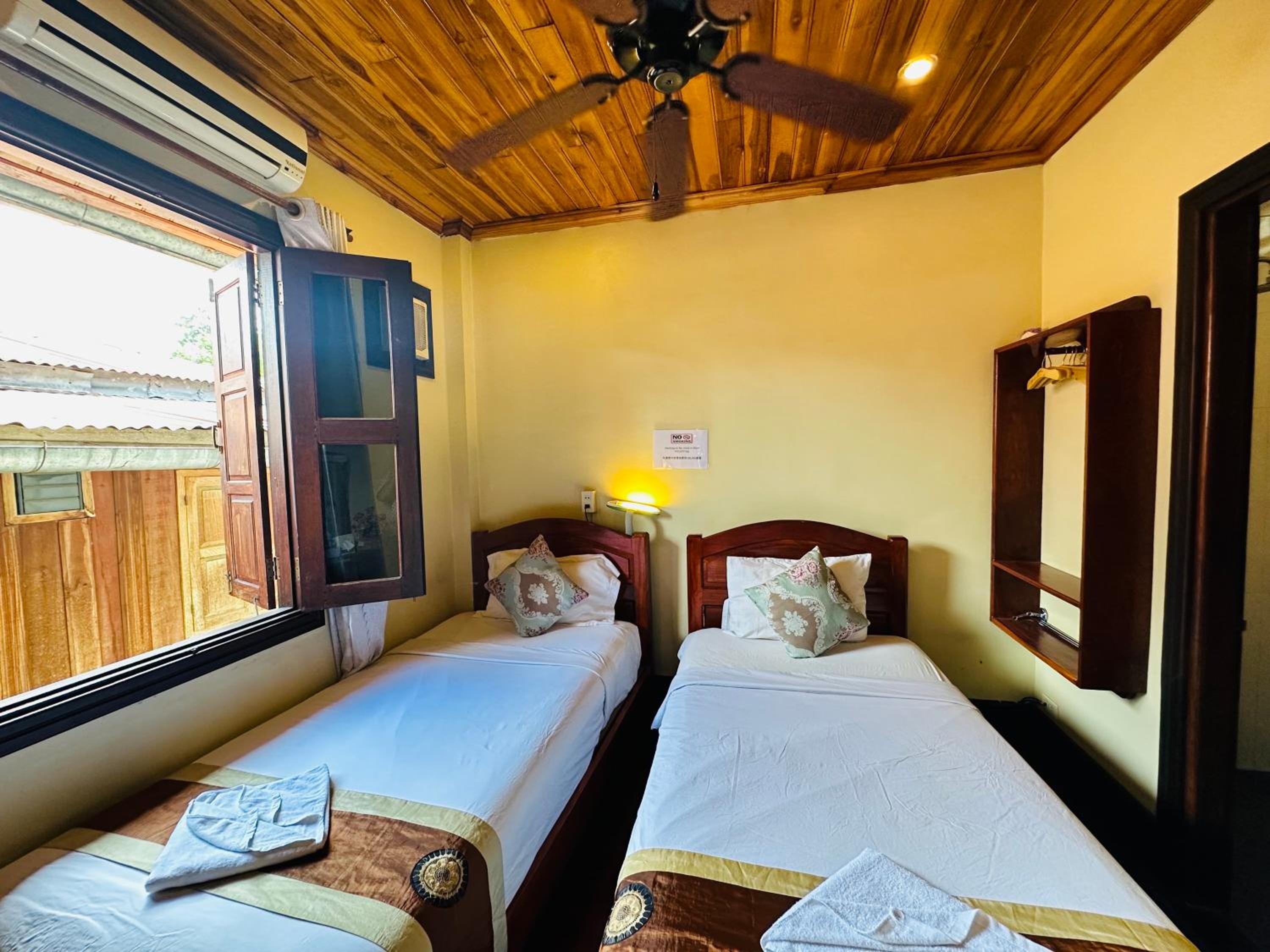 Deluxe Twin Room - Photo 12
