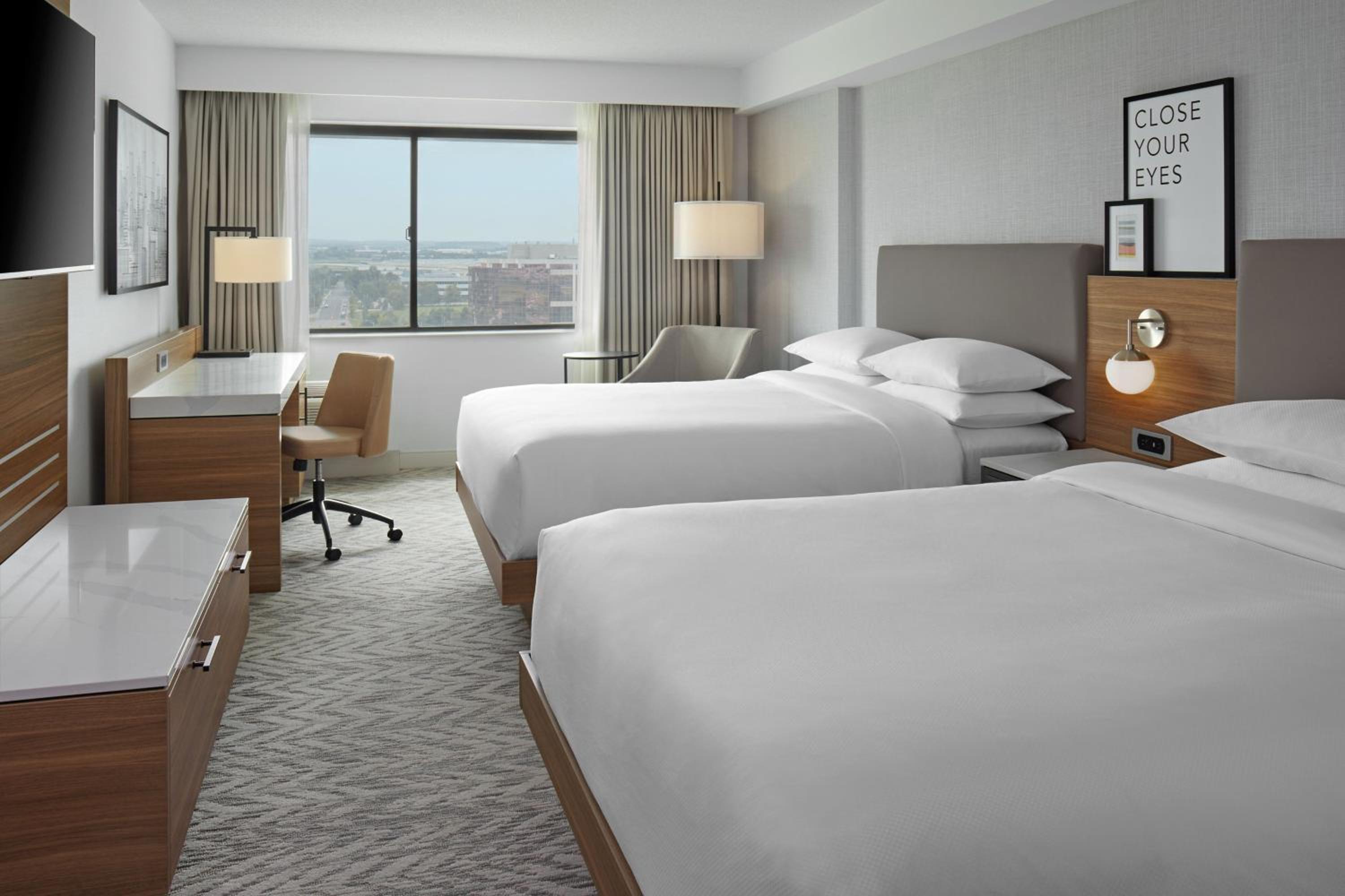 Queen Room with Two Queen Beds - Photo 1