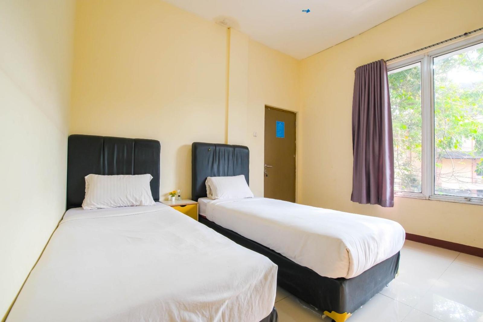 Standard Twin Room - Photo 1