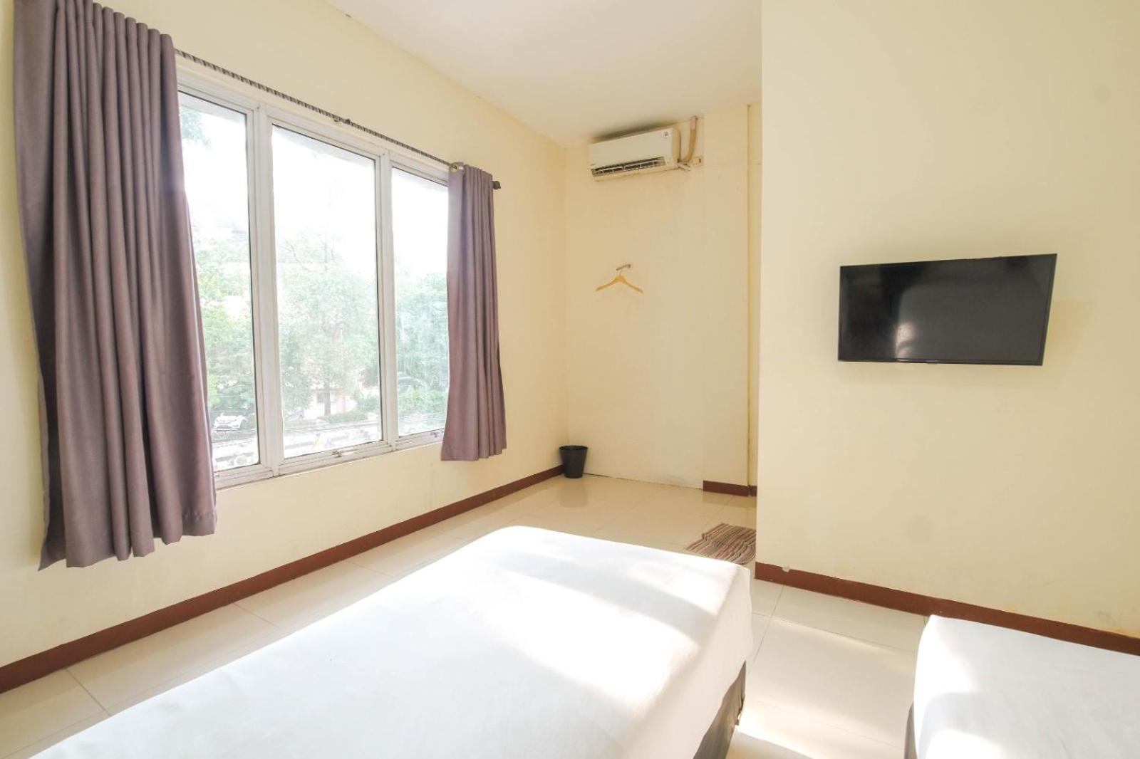 Standard Twin Room - Photo 5