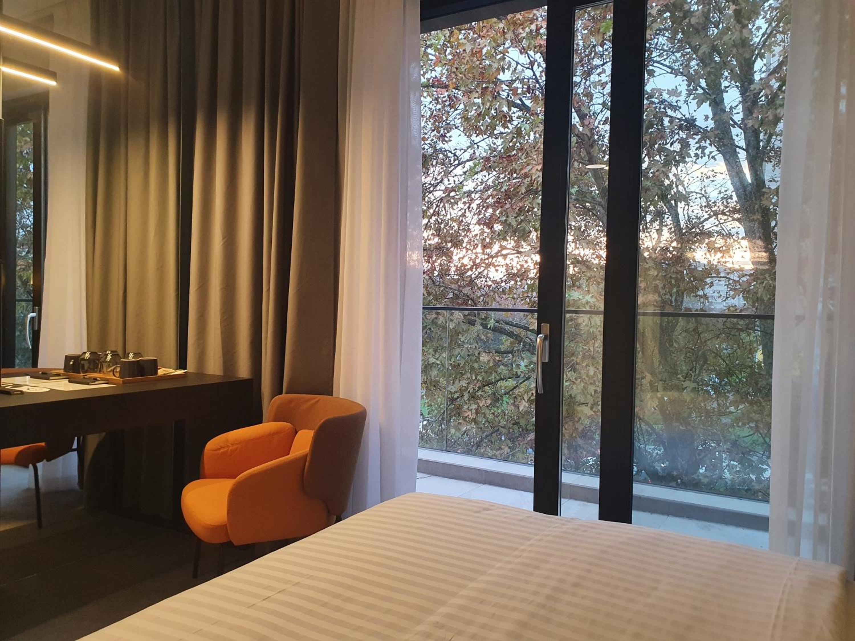 Deluxe Double Room with Balcony - Photo 14
