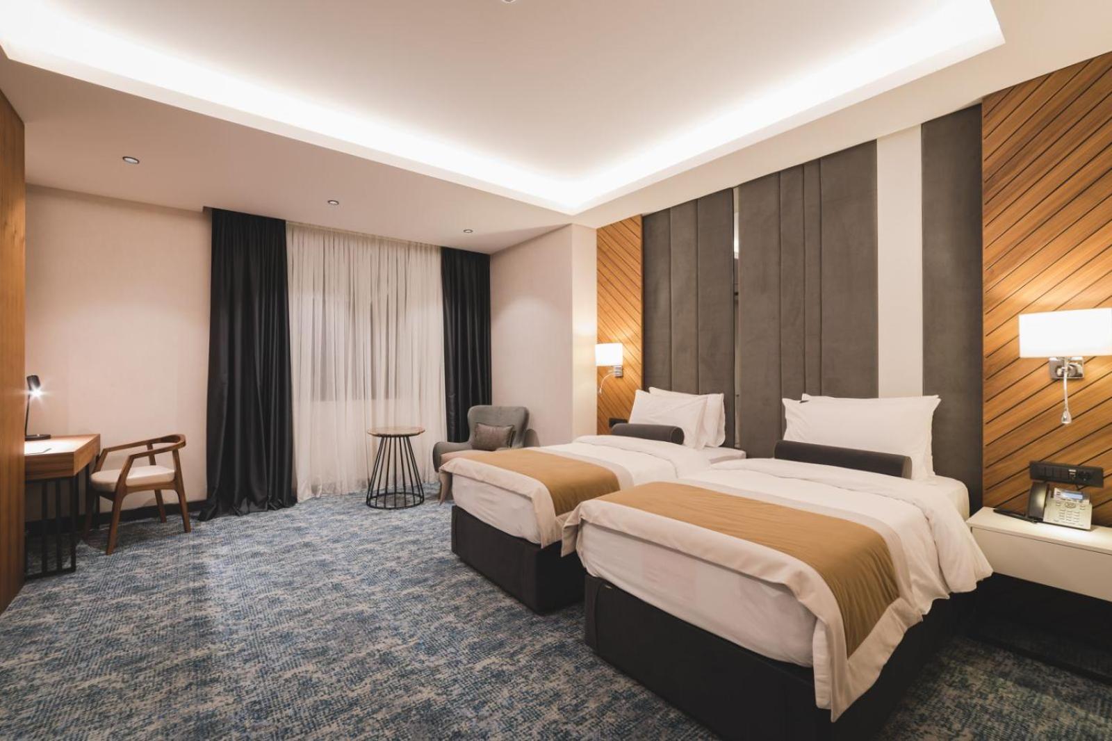 Twin Room - Photo 1