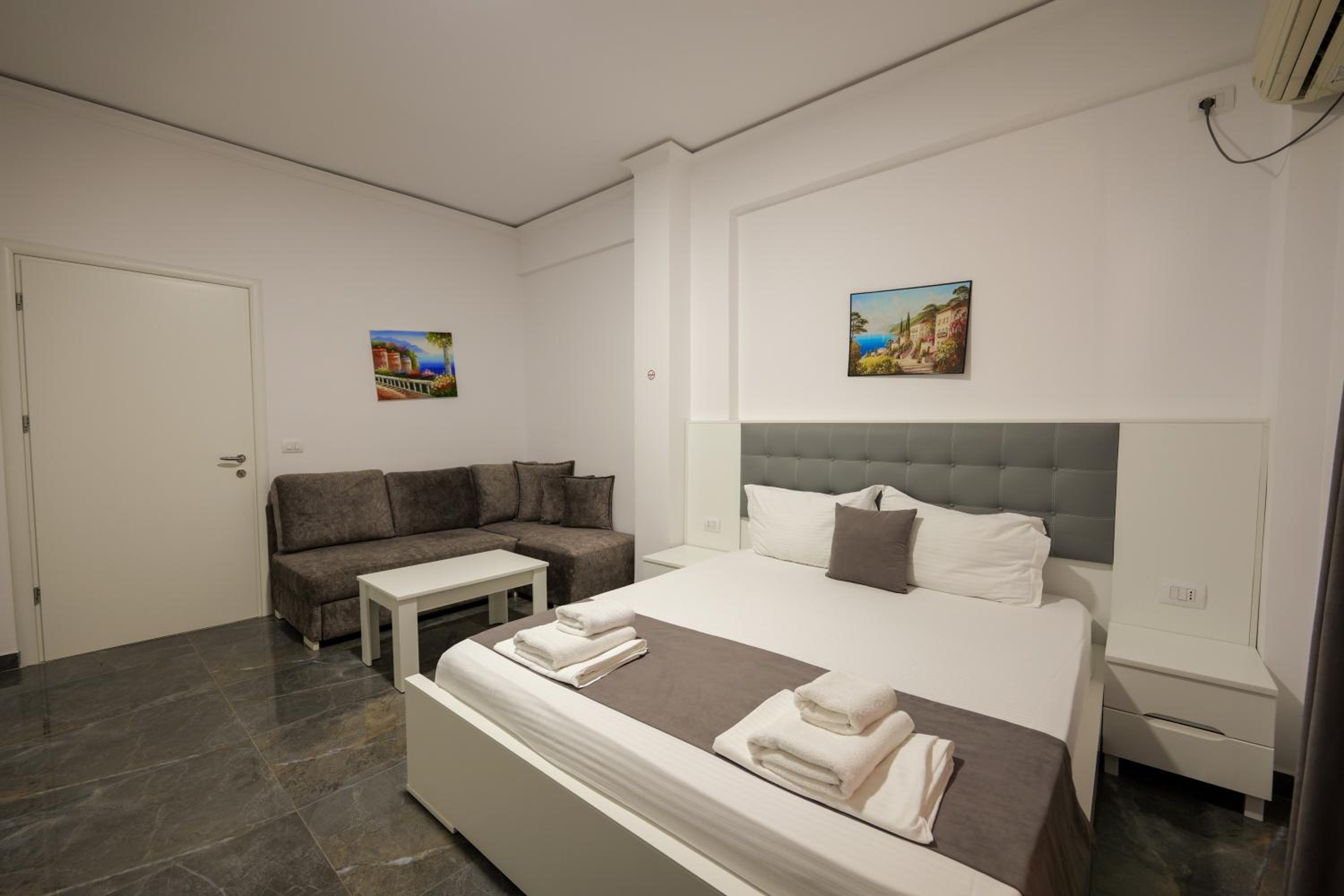 Quadruple Room with Side Sea View