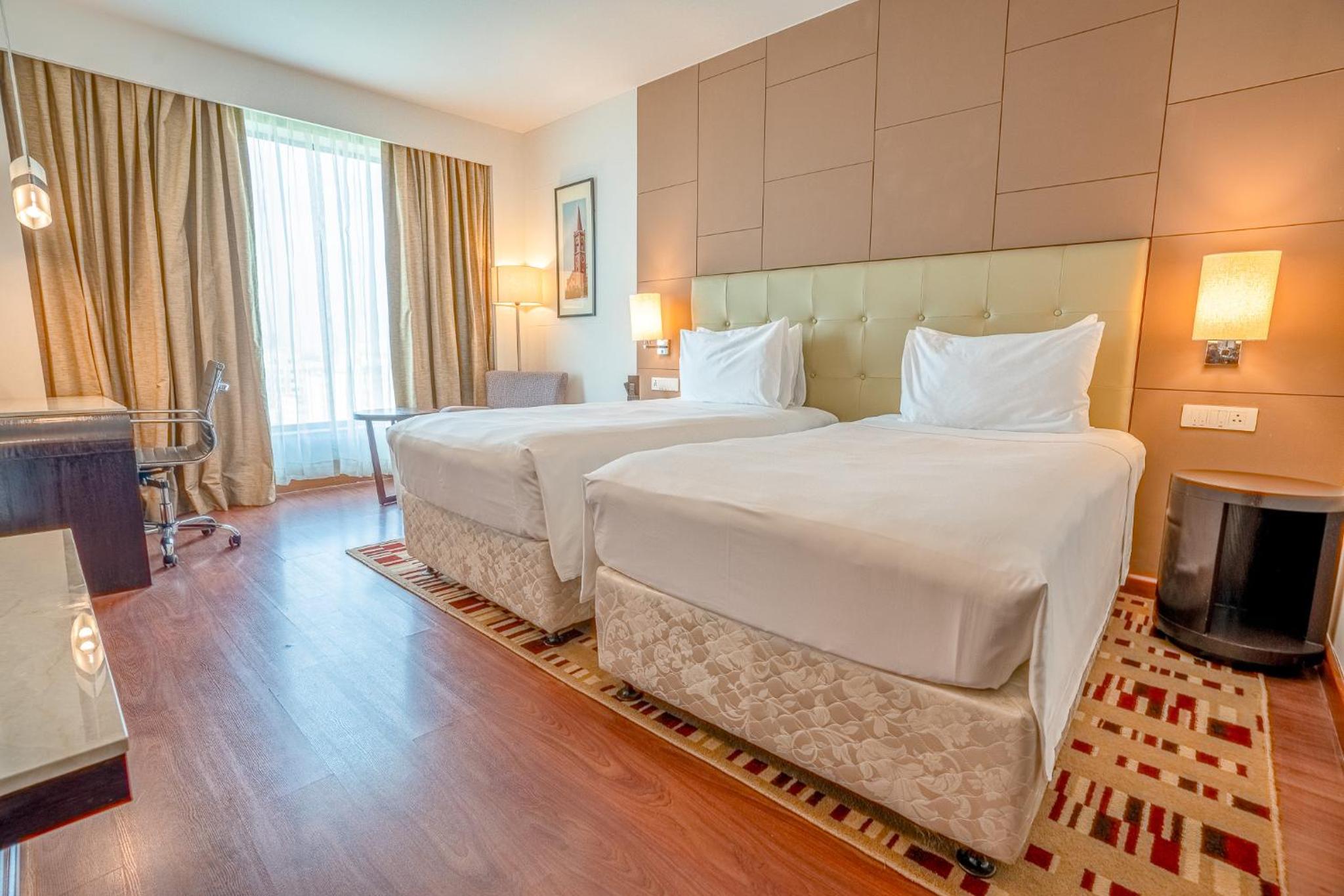Business Class Room with INR 1000 beverage credit (min. spend ₹3,500), 20% off on F&B , 2 beers per stay and access to Business Lounge