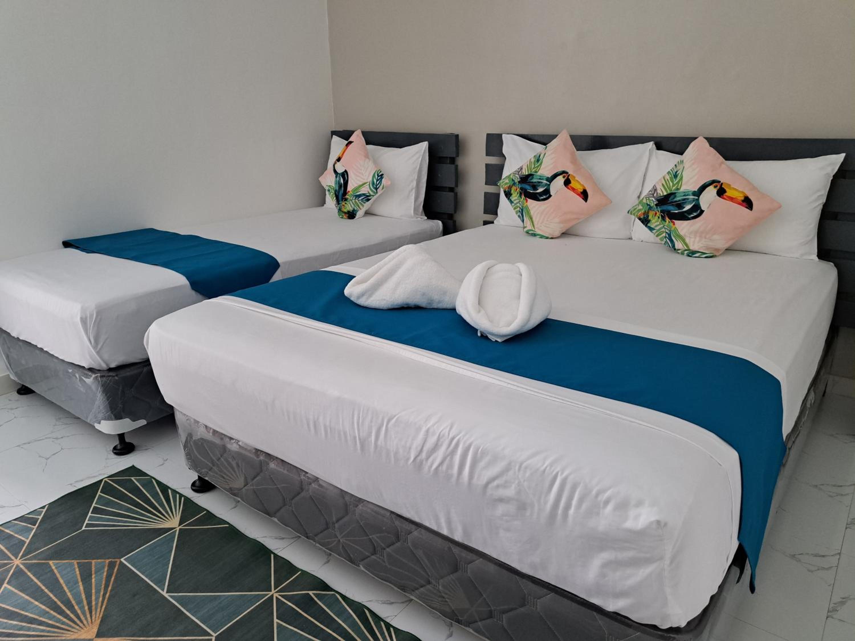 Deluxe Triple Room - Photo 10