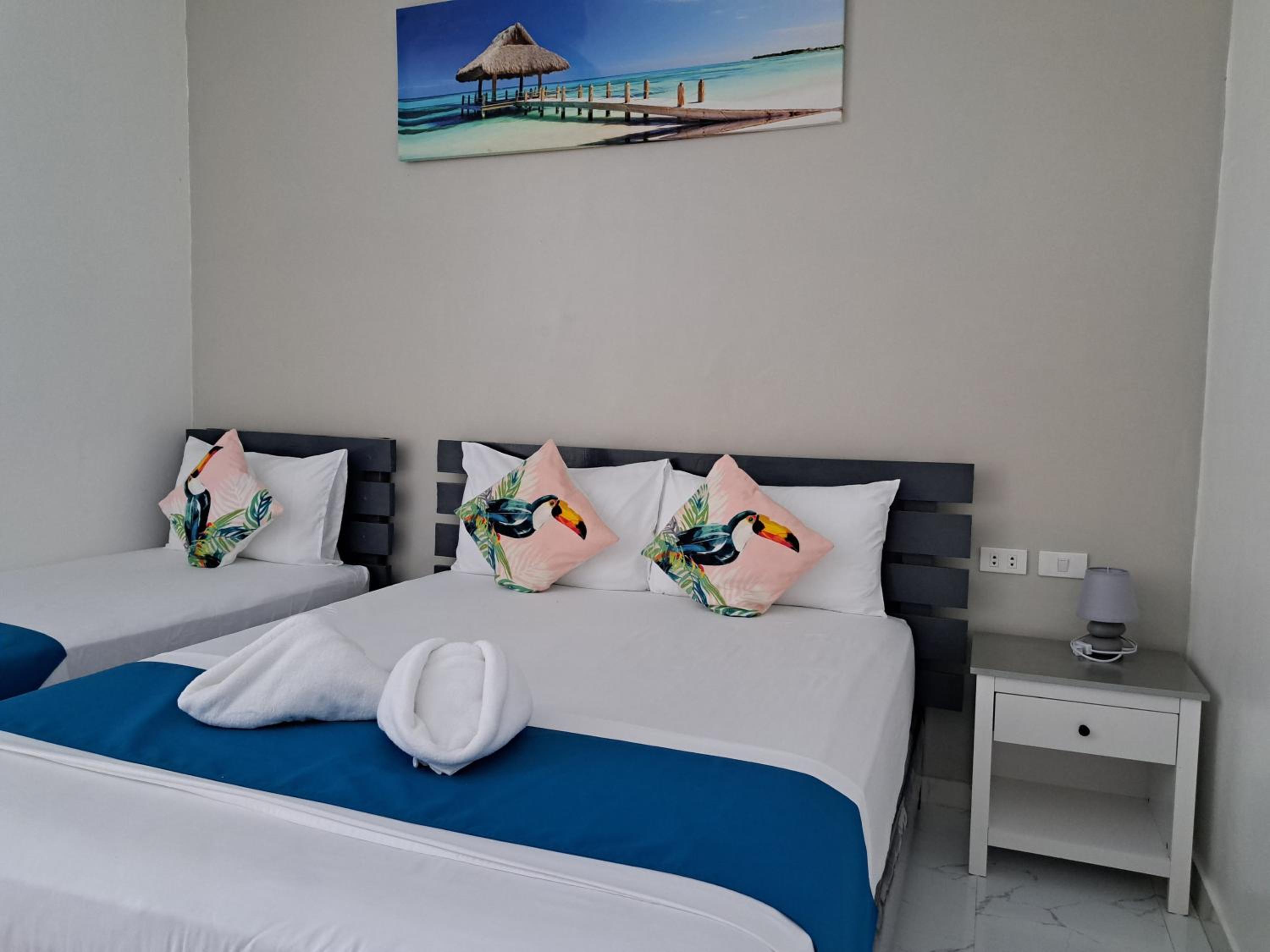 Deluxe Triple Room - Photo 8