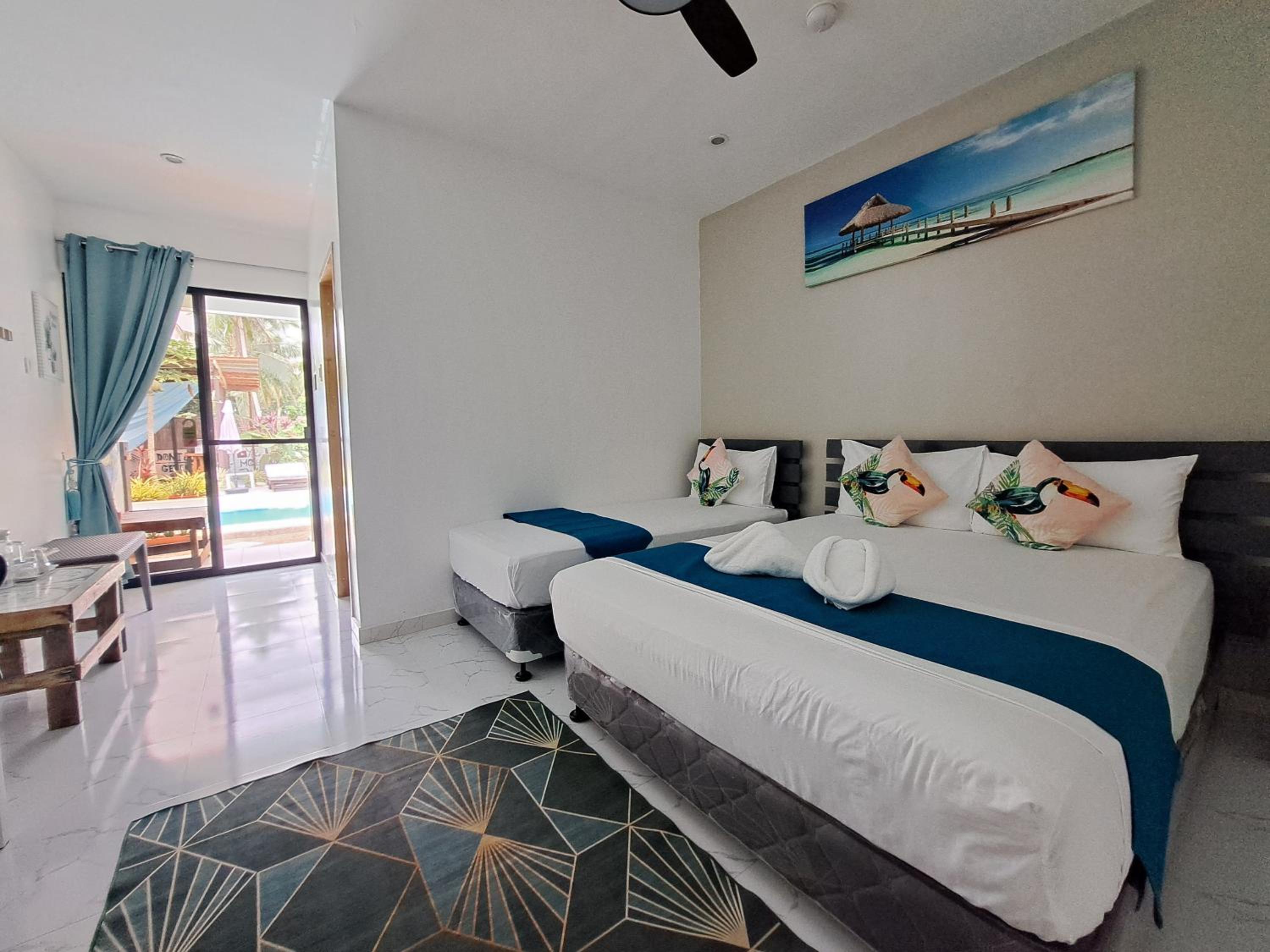 Deluxe Triple Room - Photo 6