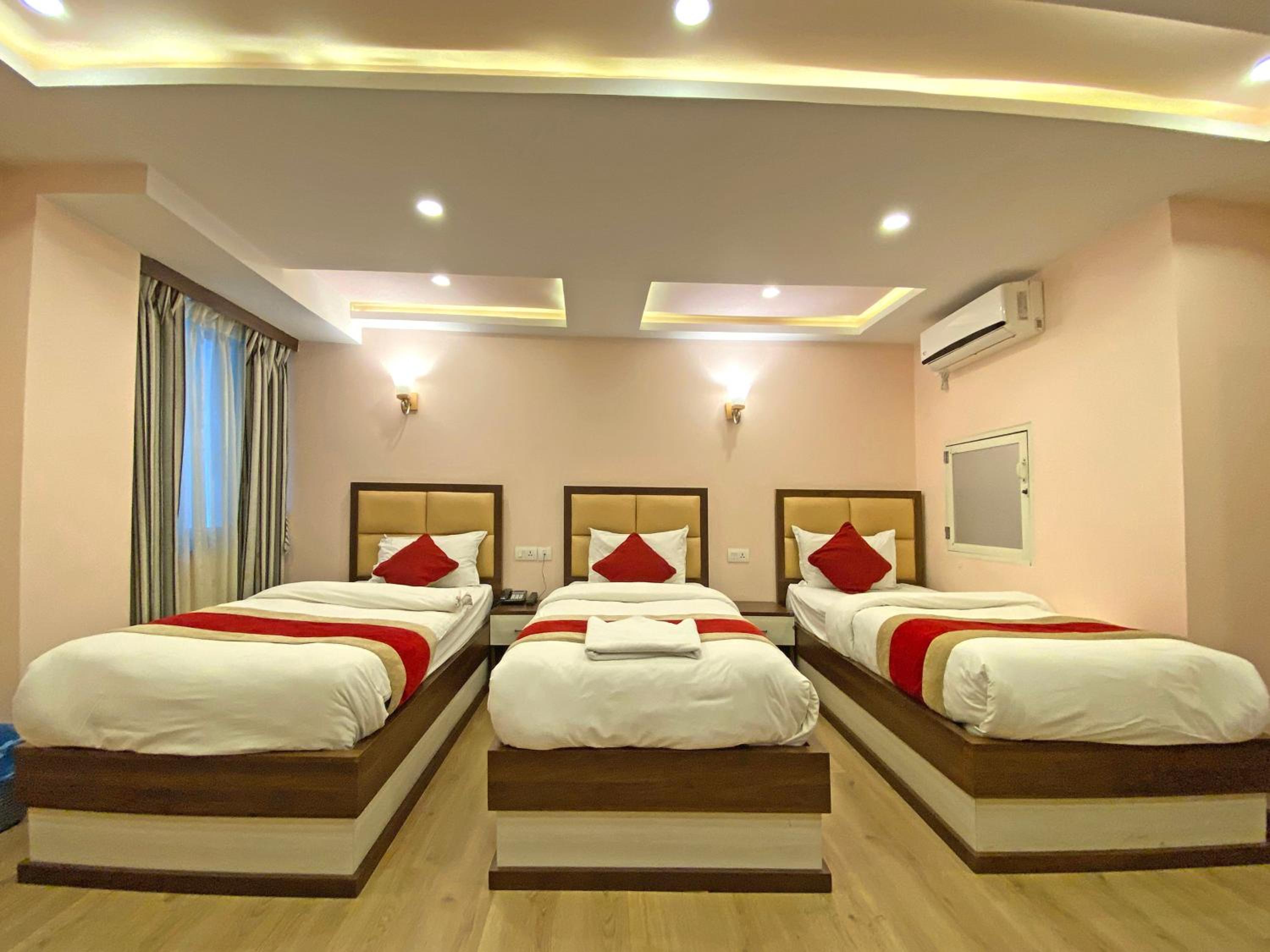Deluxe Triple Room
